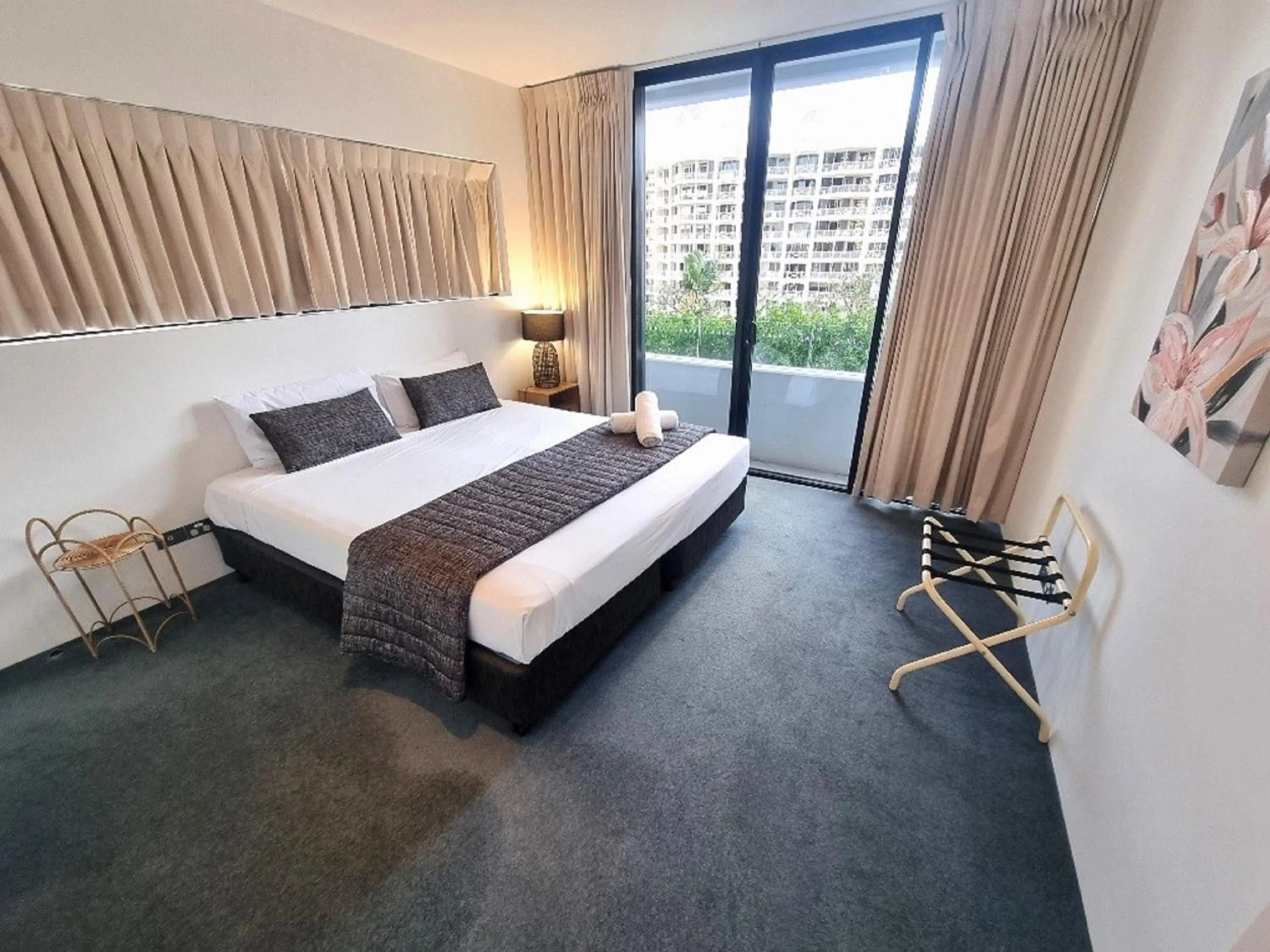 Bed in Aria Apartments