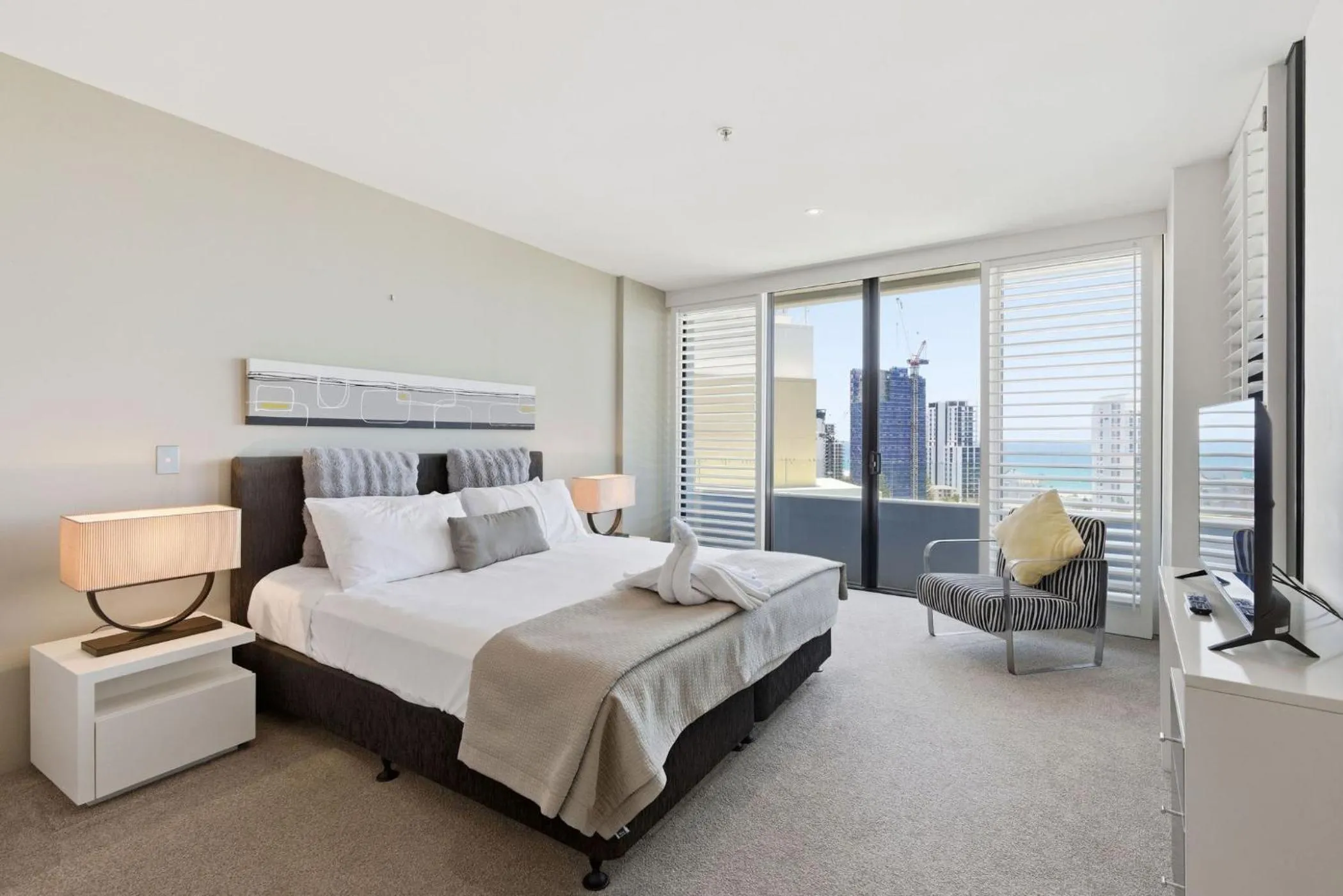 Bed in Aria Apartments