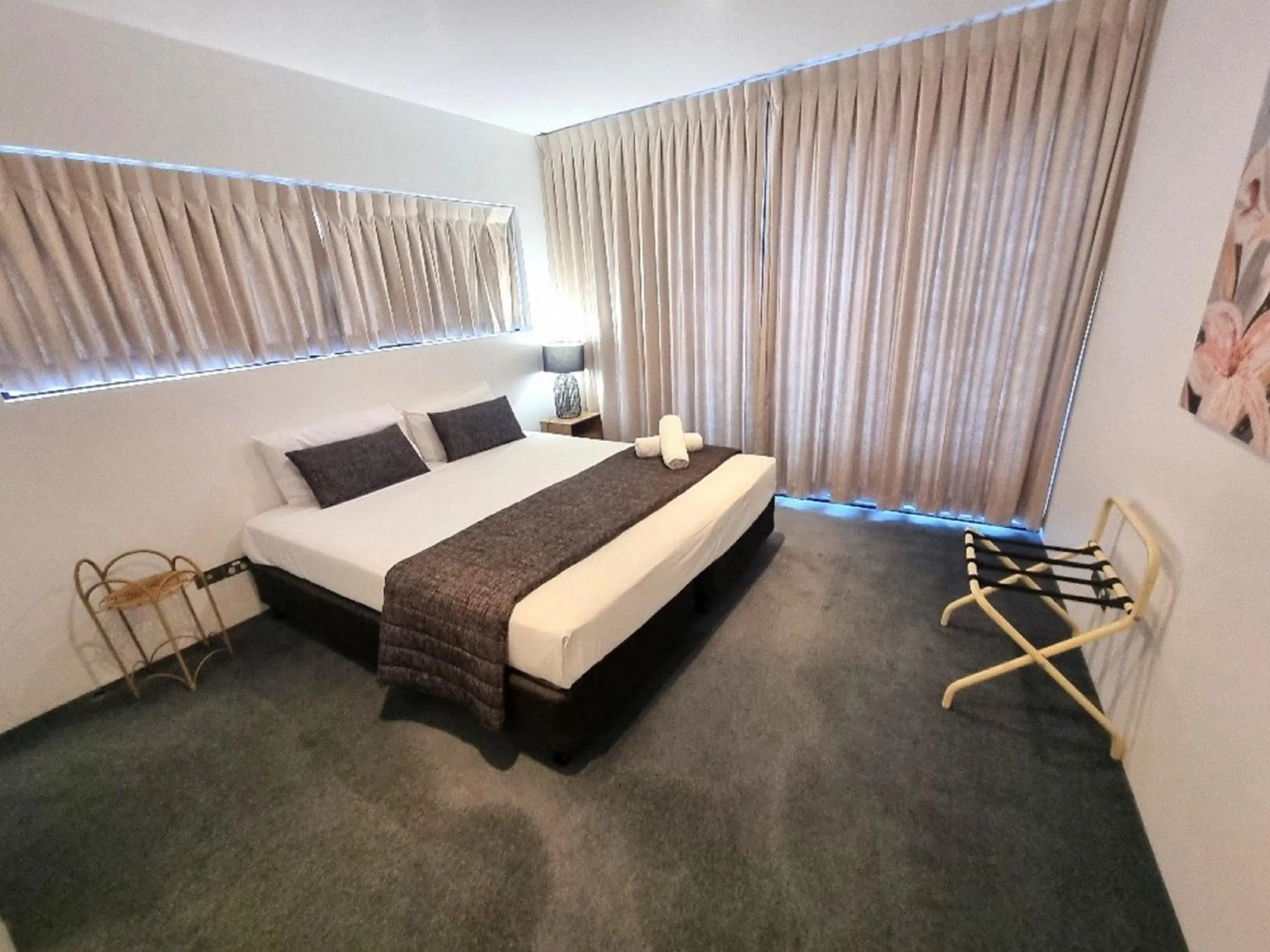 Bed in Aria Apartments