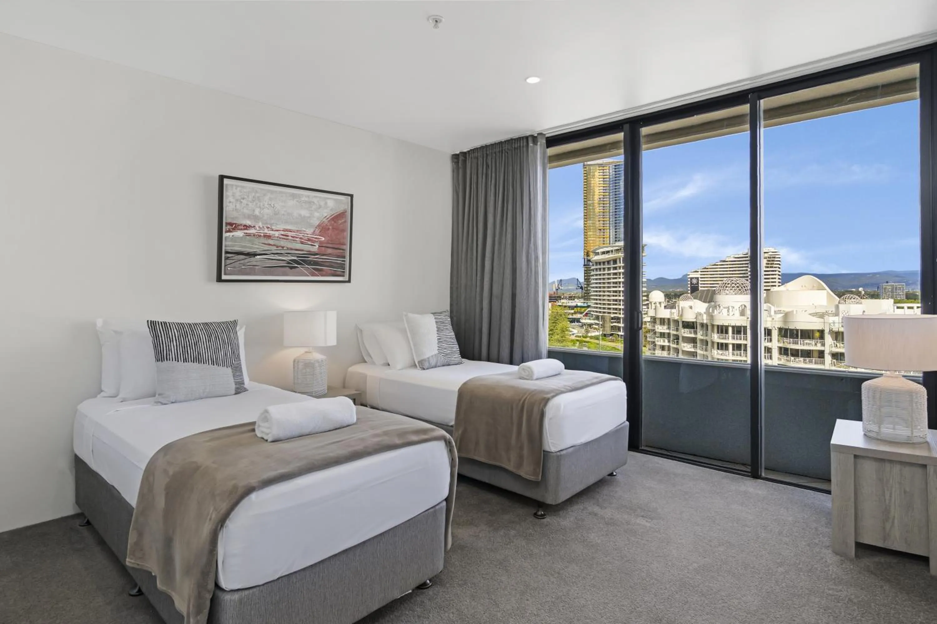 Bed in Aria Apartments