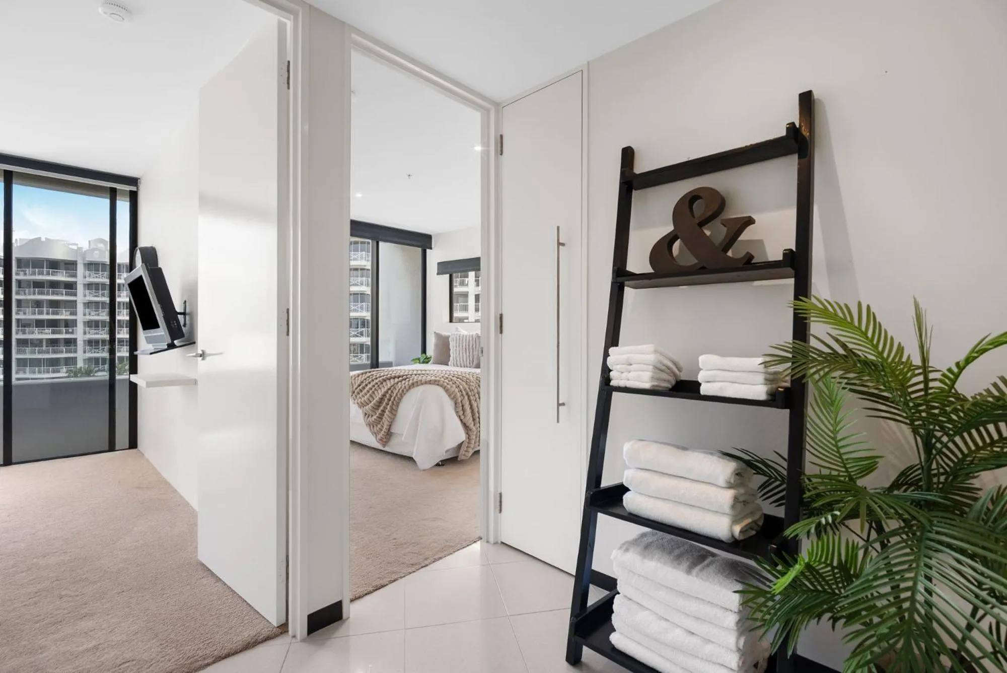 Bed in Aria Apartments