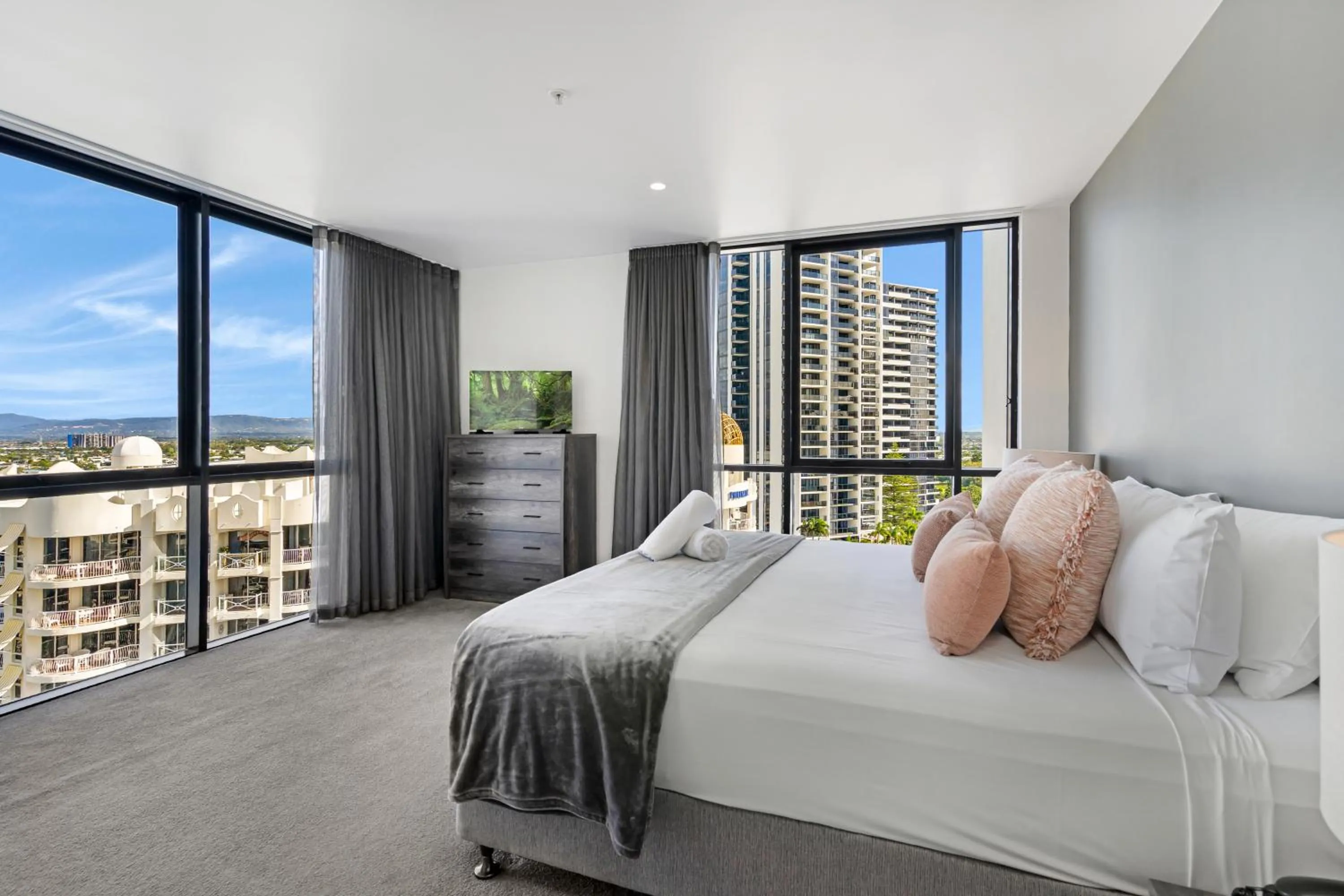 Bed in Aria Apartments