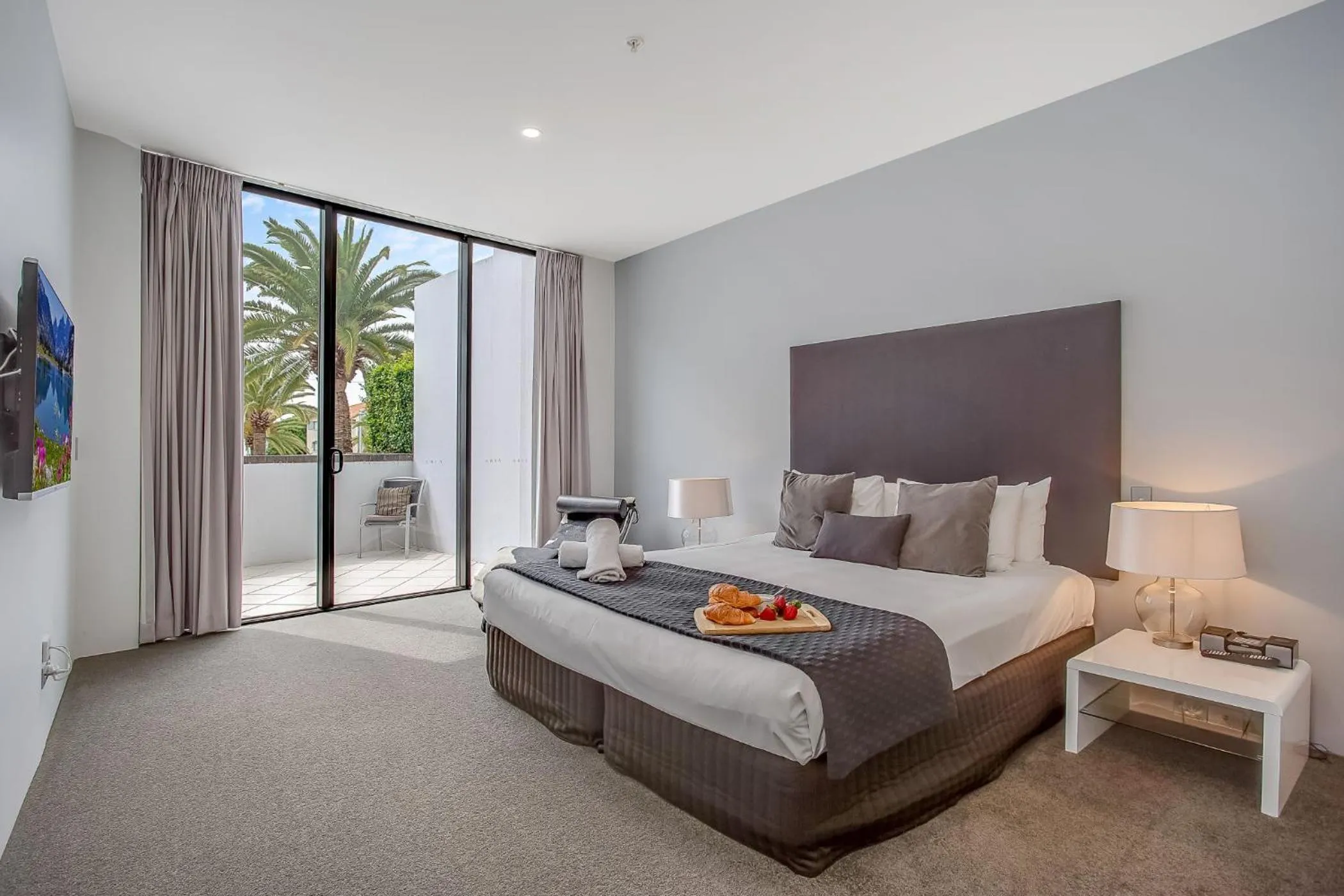 Bed in Aria Apartments