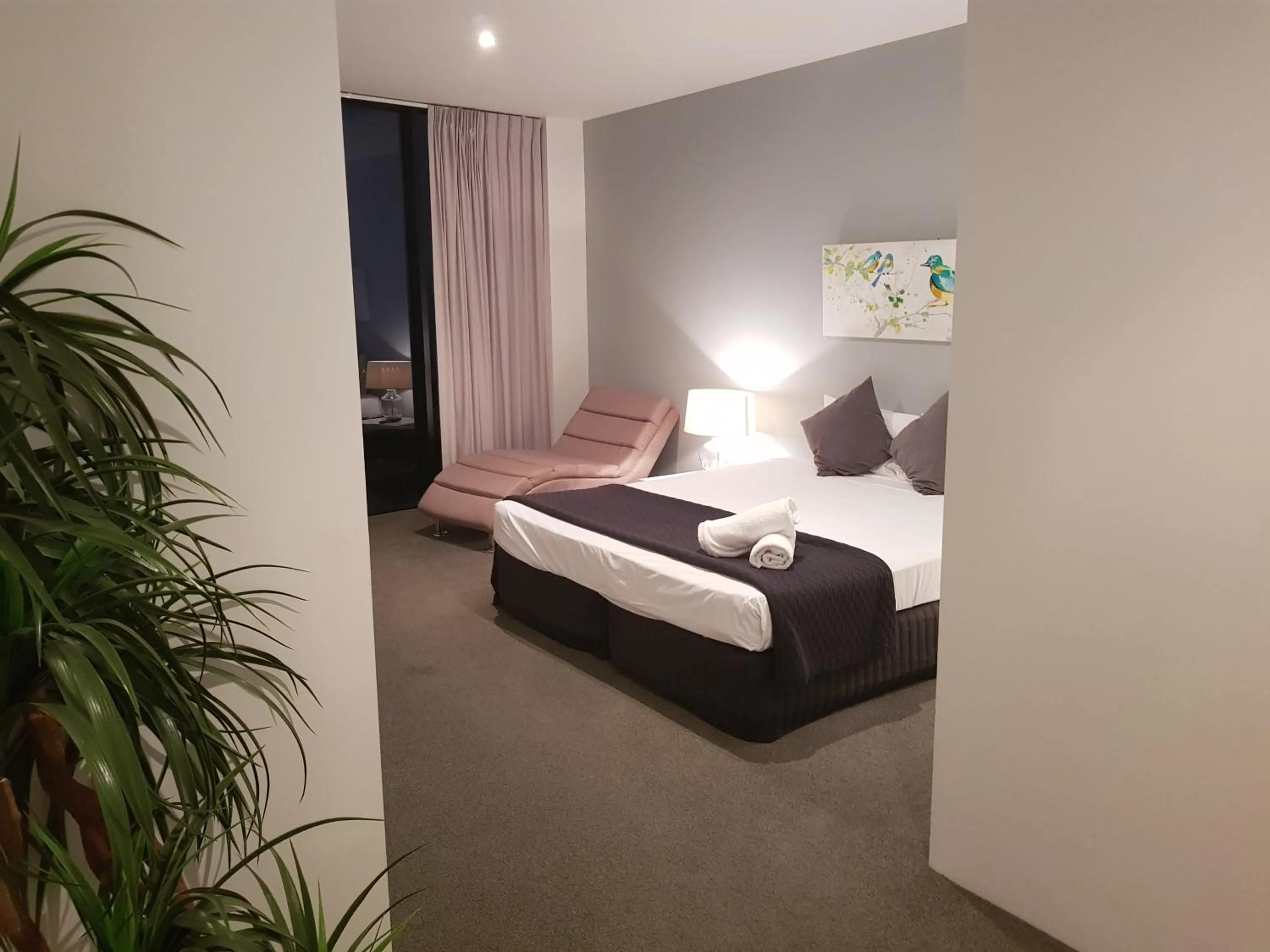 Bed in Aria Apartments