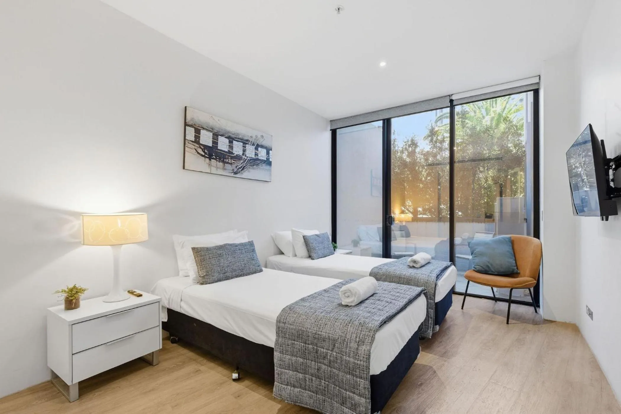 Bed in Aria Apartments