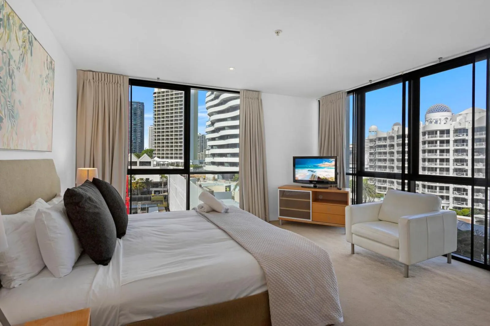 Bed in Aria Apartments