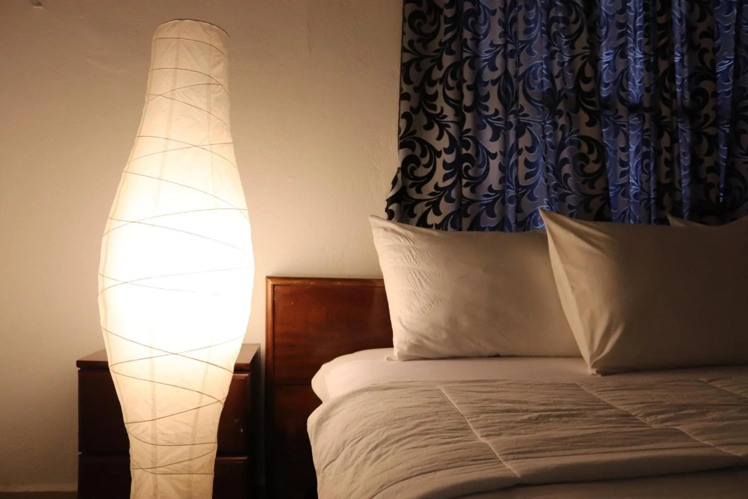 Bed in Paloma Guest House