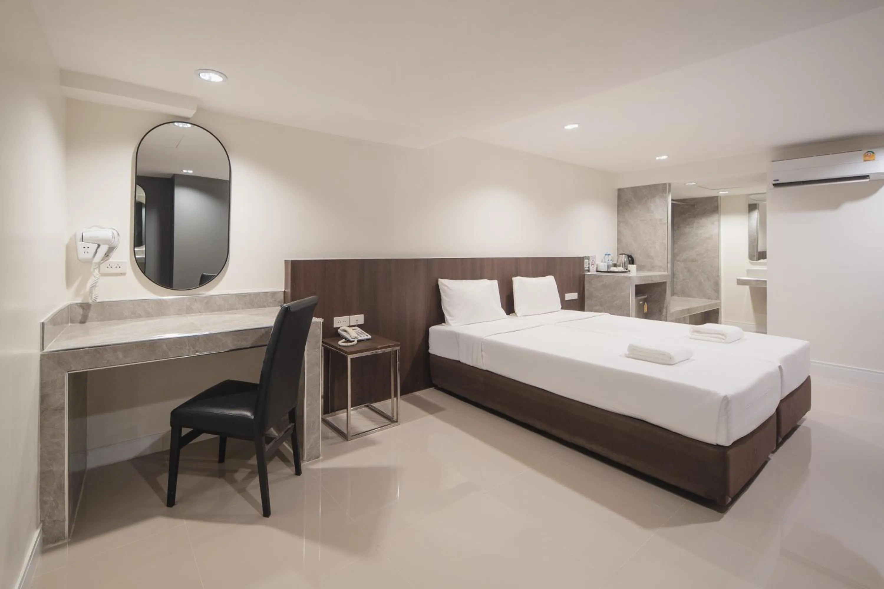 Bed in Grand Alpine Hotel