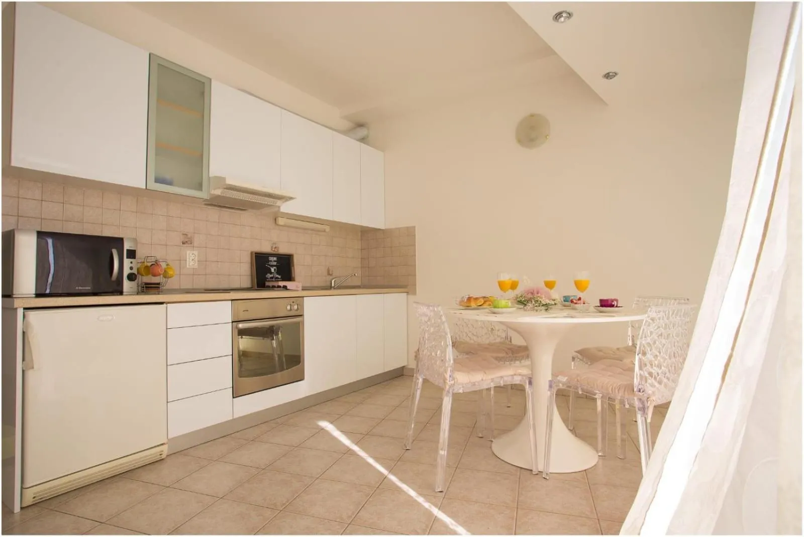 Kitchen or kitchenette in Apartments Maja