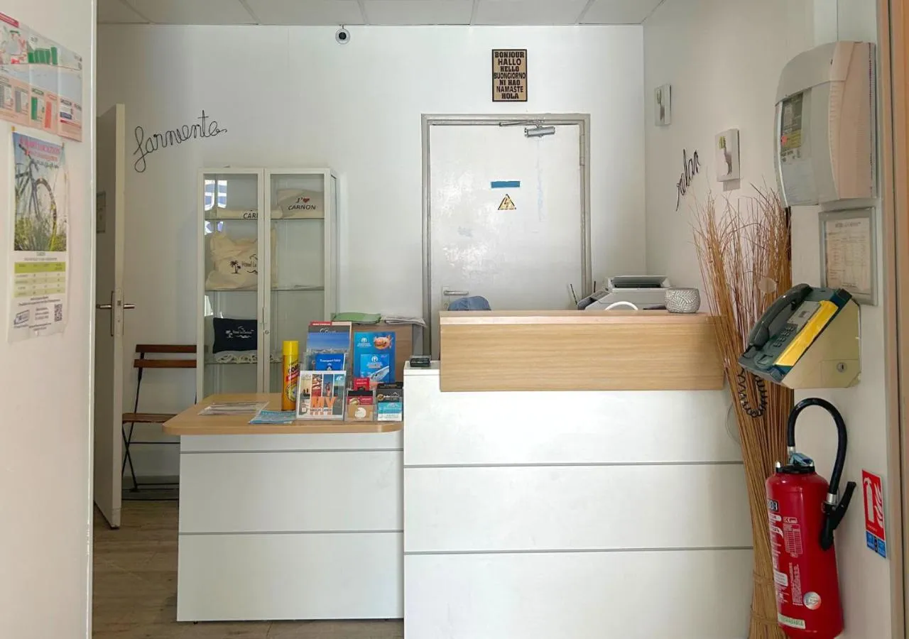 Lobby or reception in Hôtel Le Carnon