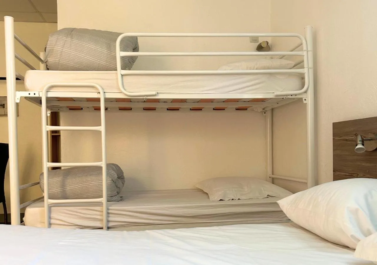 Bed in Hôtel Le Carnon