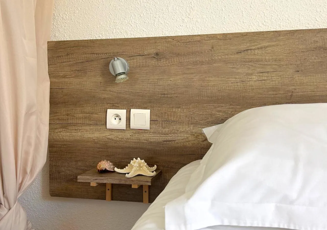 Bed in Hôtel Le Carnon