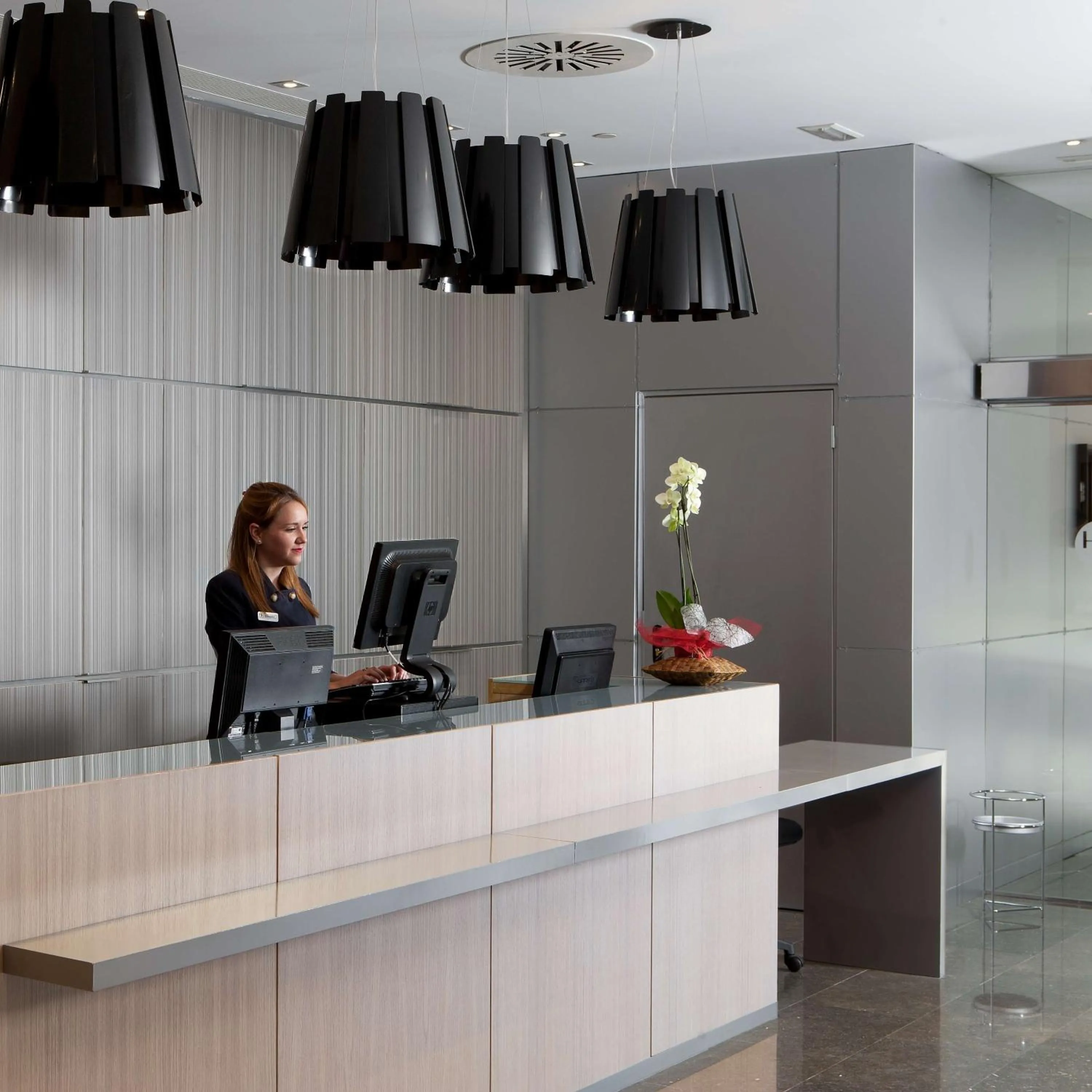 Lobby or reception in NH Barcelona Diagonal Center