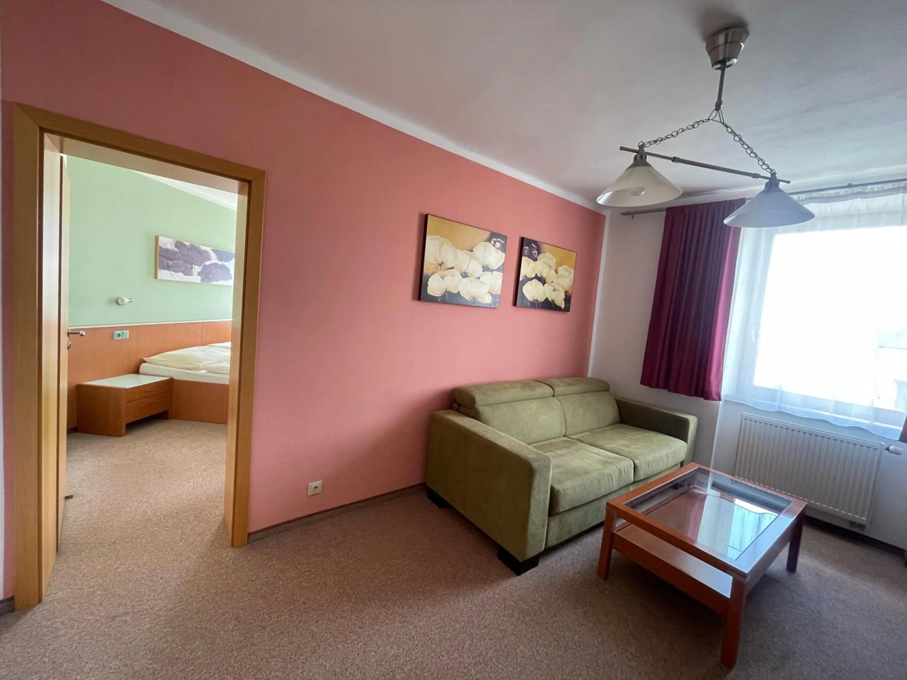 Living room, Bed in Hotel Ostrov Garni