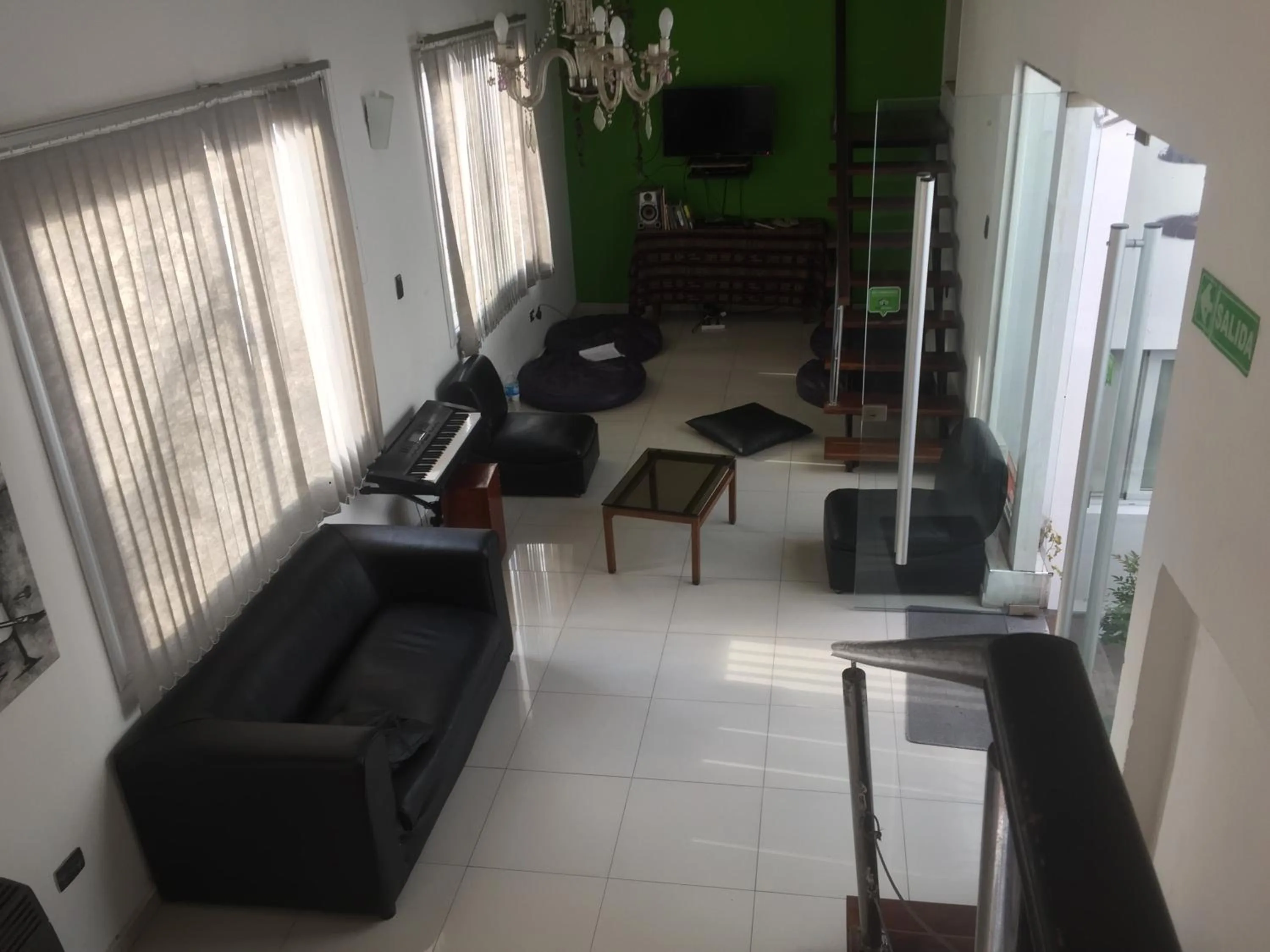 Communal lounge/ TV room in Link Cordoba Hostel