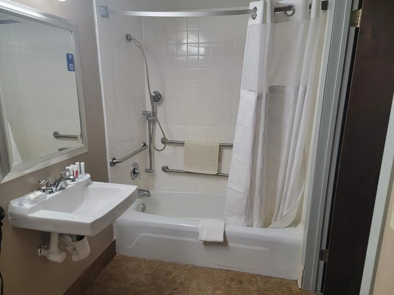 Bathroom in Ramada by Wyndham Angola/Fremont Area