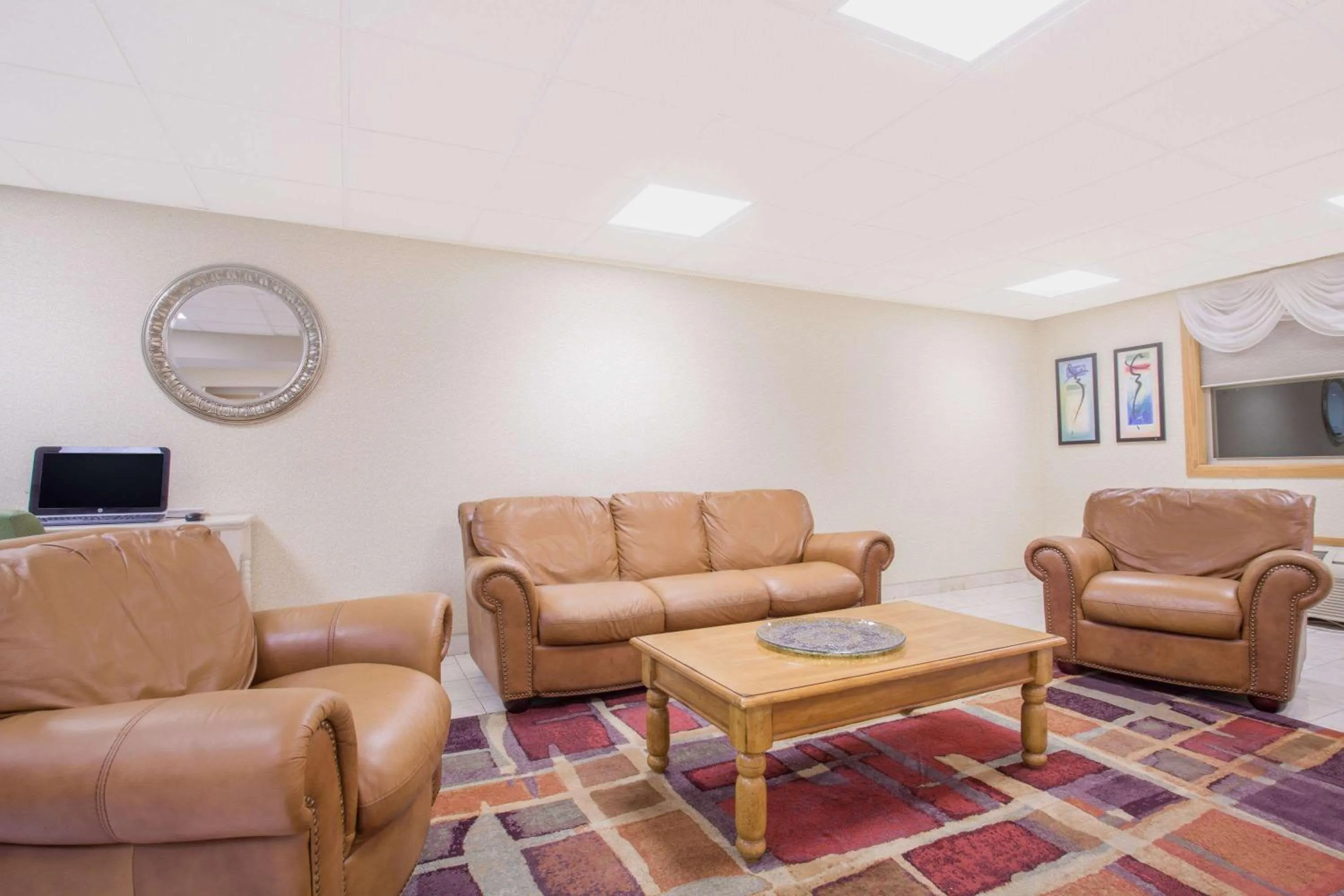 Lobby or reception in Ramada by Wyndham Angola/Fremont Area