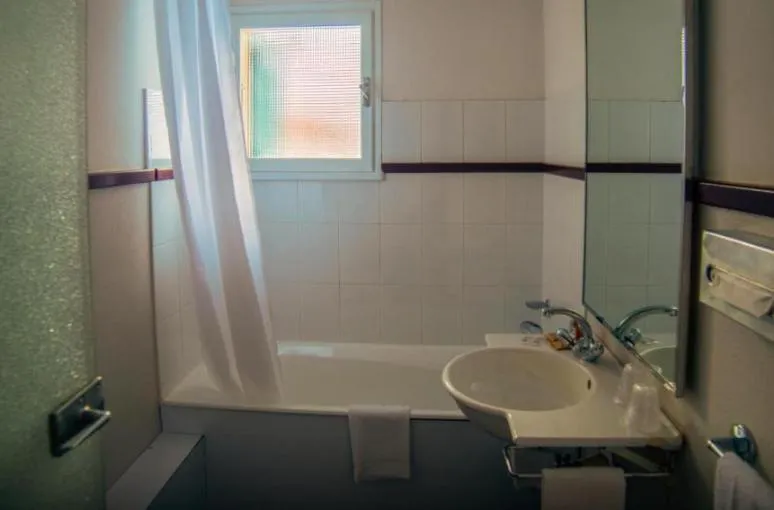 Bathroom in Hôtel Arbois Bettex