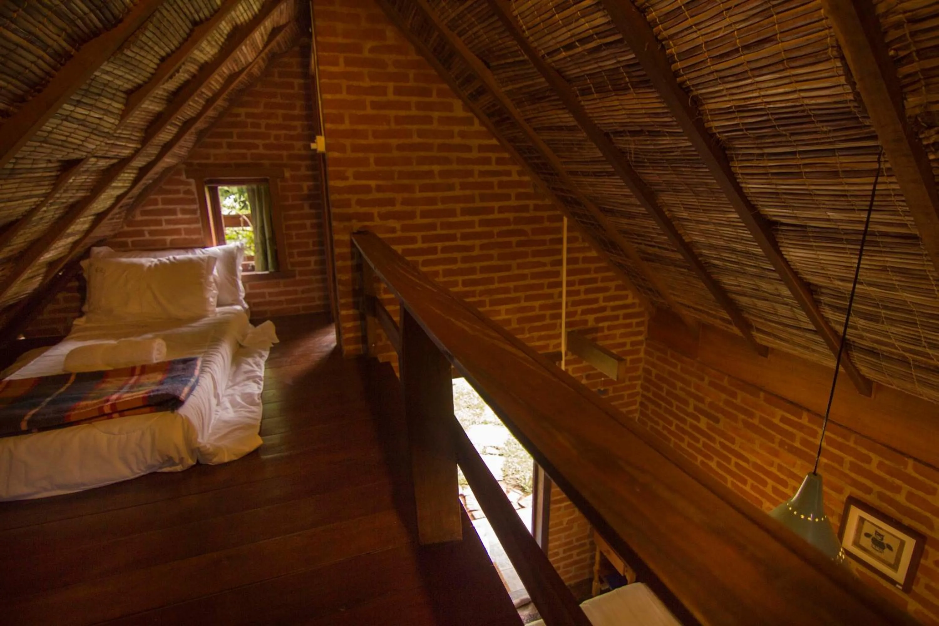 Bed in Pousada Canto da Lua
