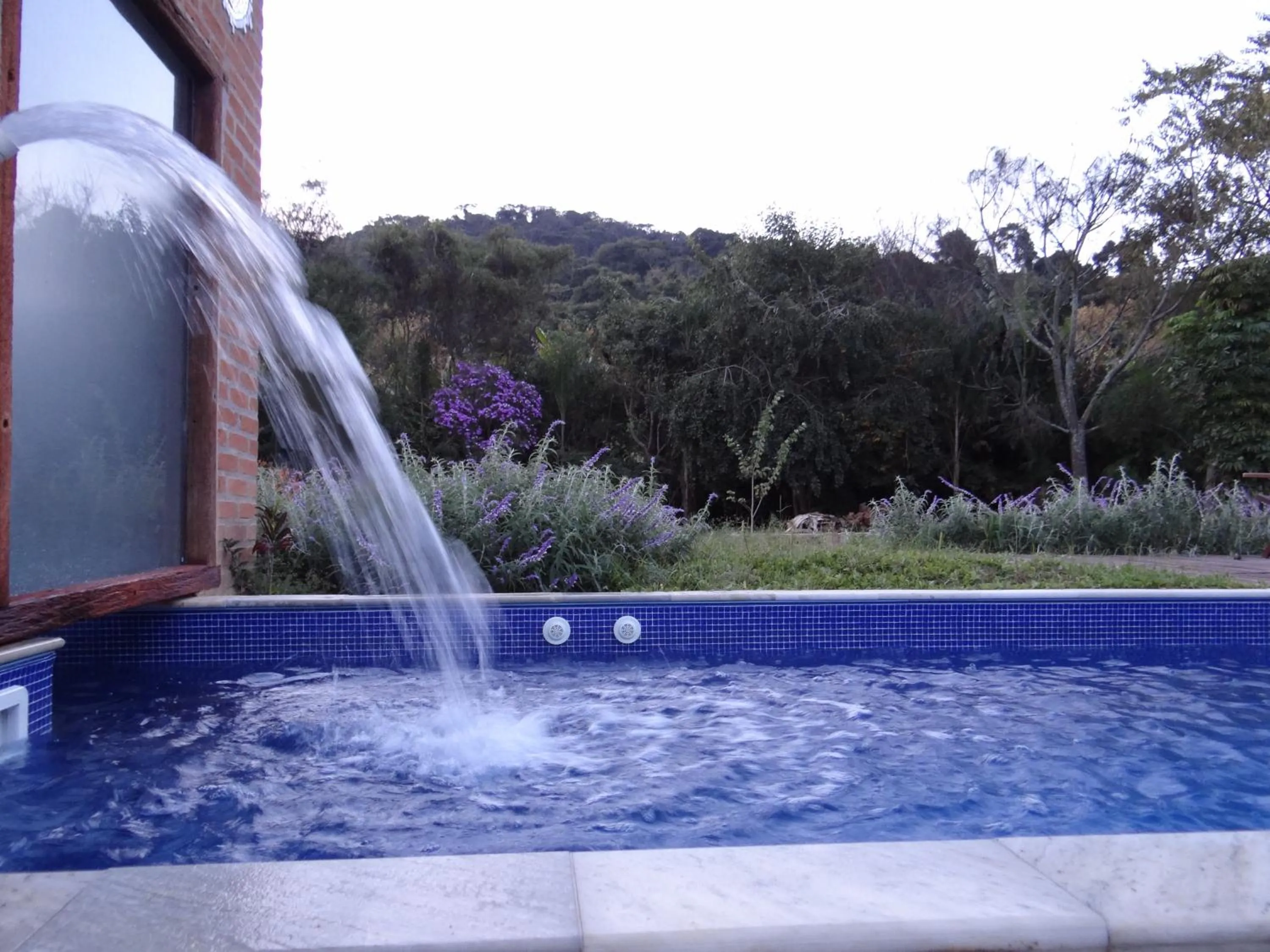Swimming pool in Pousada Canto da Lua