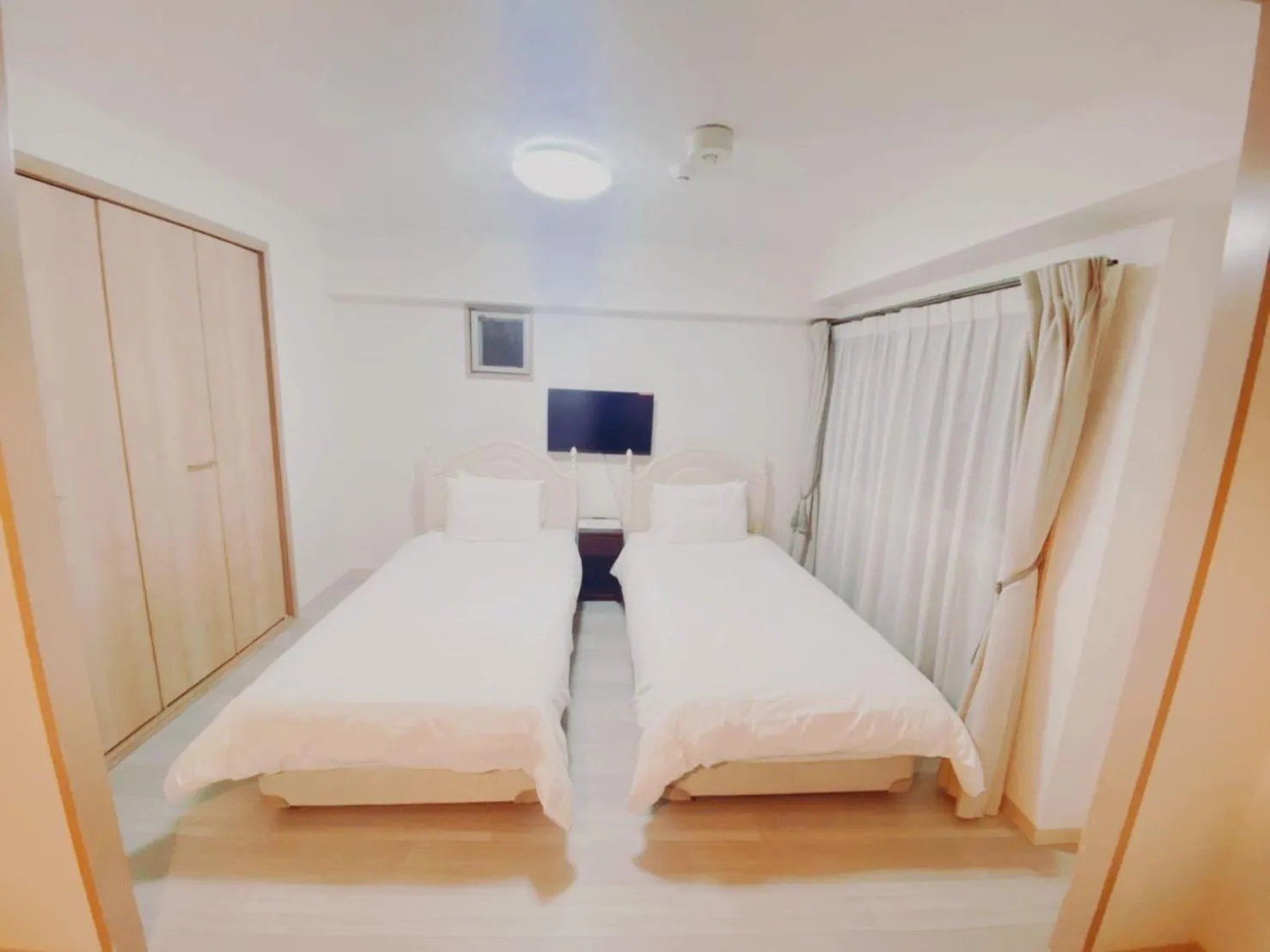 Bed in Apartment HOTEL KIRO Kyoto STATION