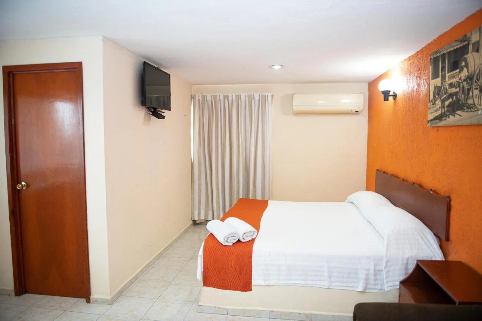 Bed in Hotel Uxulkah