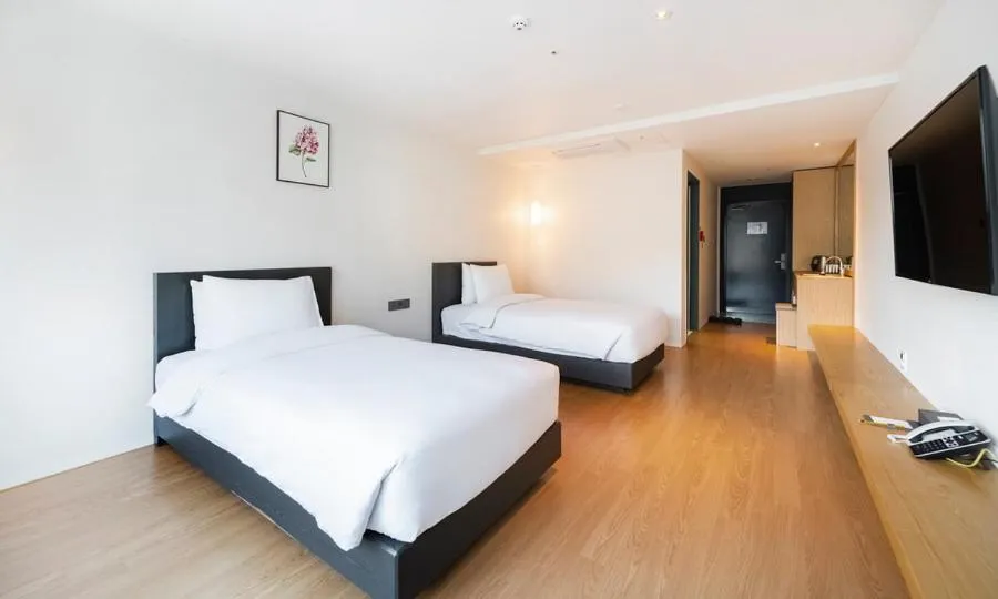 Bed in Yeosu Hotel Haven