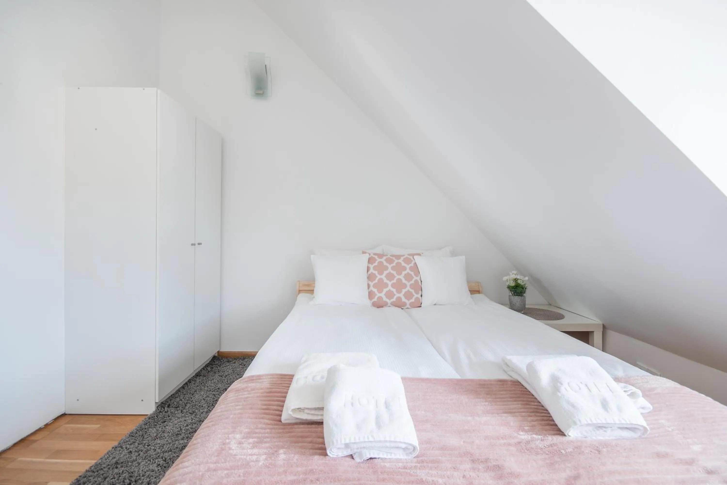 Bed in Riviera Residence Apartments