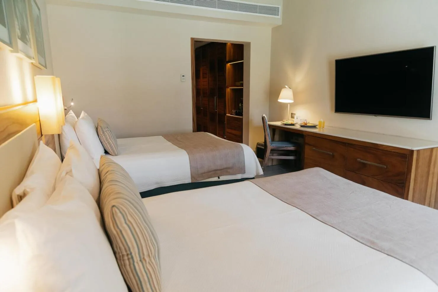 Photo of the whole room, Bed in Emporio Cancun - Buy All Inclusive Option