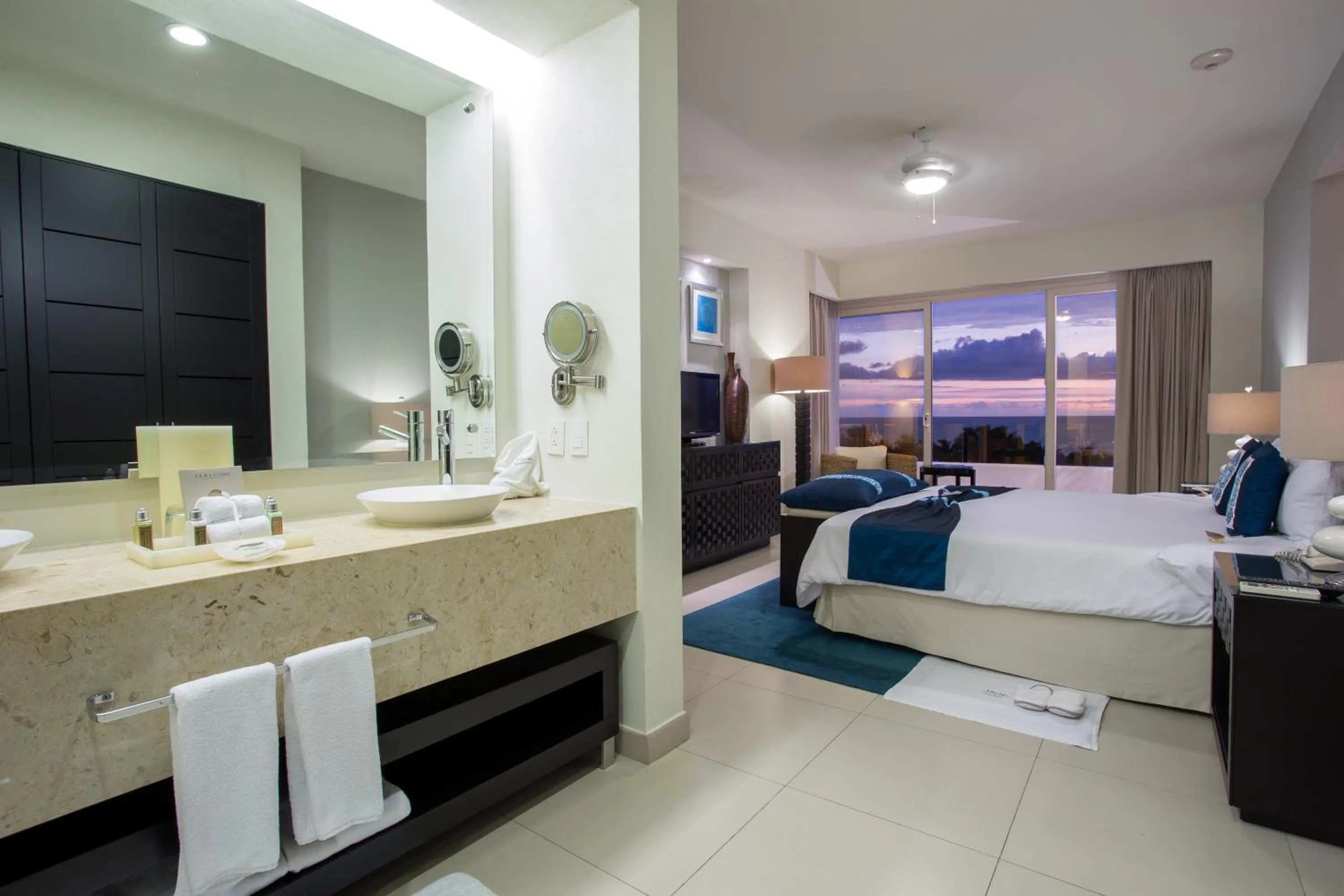 Photo of the whole room, Bed in Marival Distinct All-Suites & World Spa - Handwritten Collection