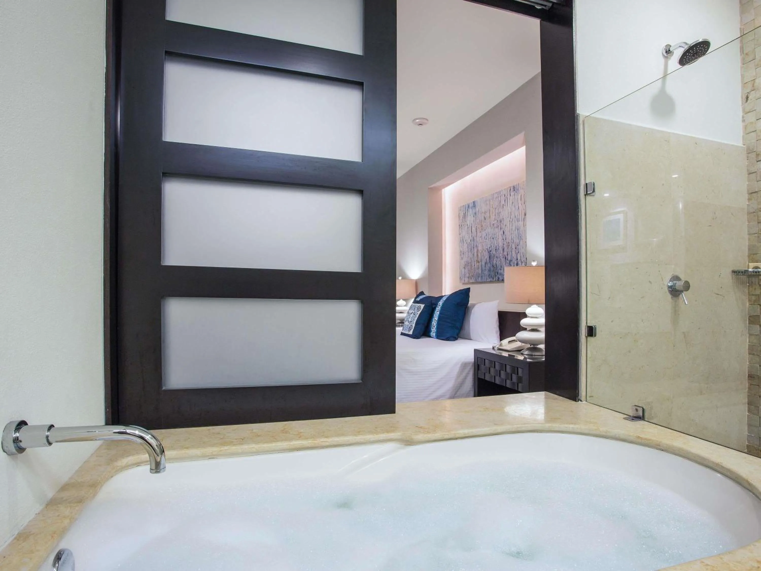 Bedroom, Bed in Marival Distinct All-Suites & World Spa - Handwritten Collection