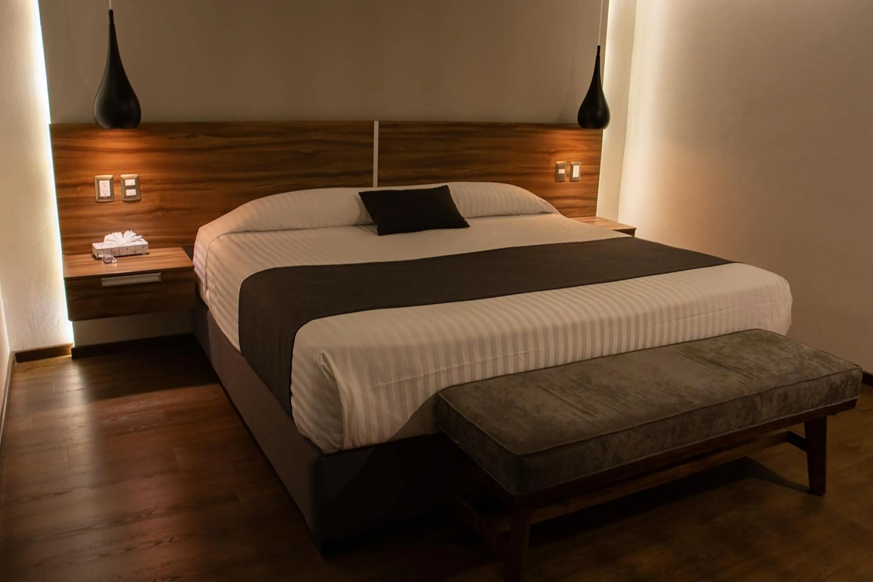 Bedroom, Bed in Estanza Hotel & Suites