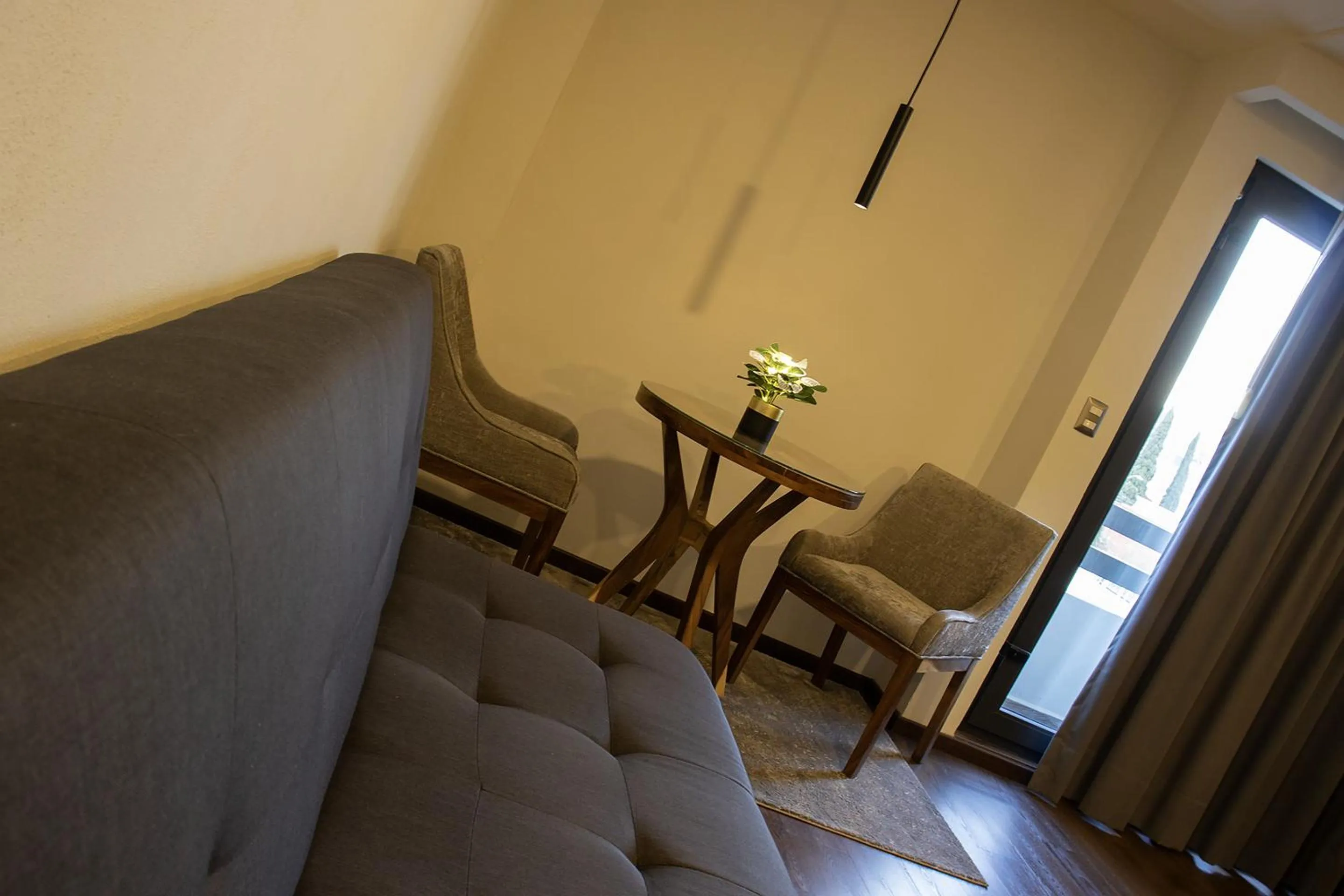 Living room in Estanza Hotel & Suites