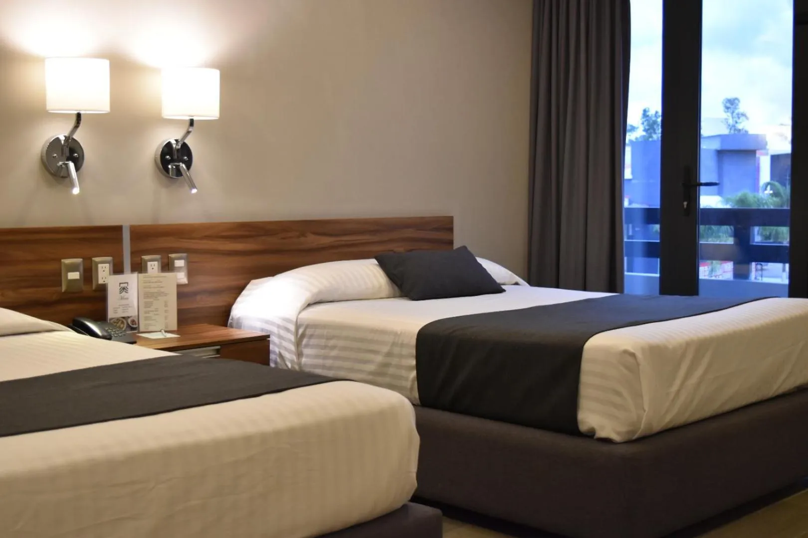 Bedroom, Bed in Estanza Hotel & Suites