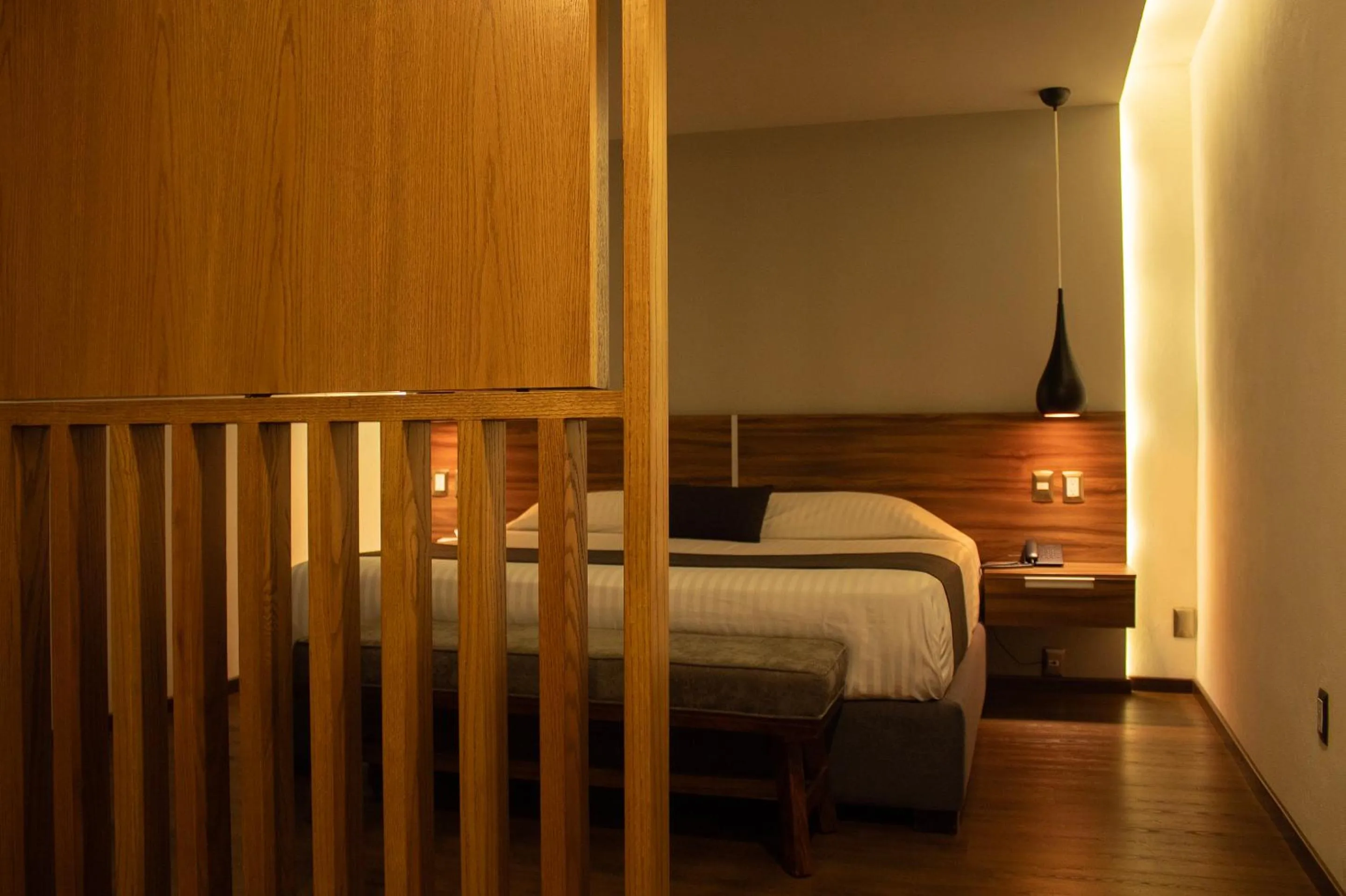 Bedroom, Bed in Estanza Hotel & Suites