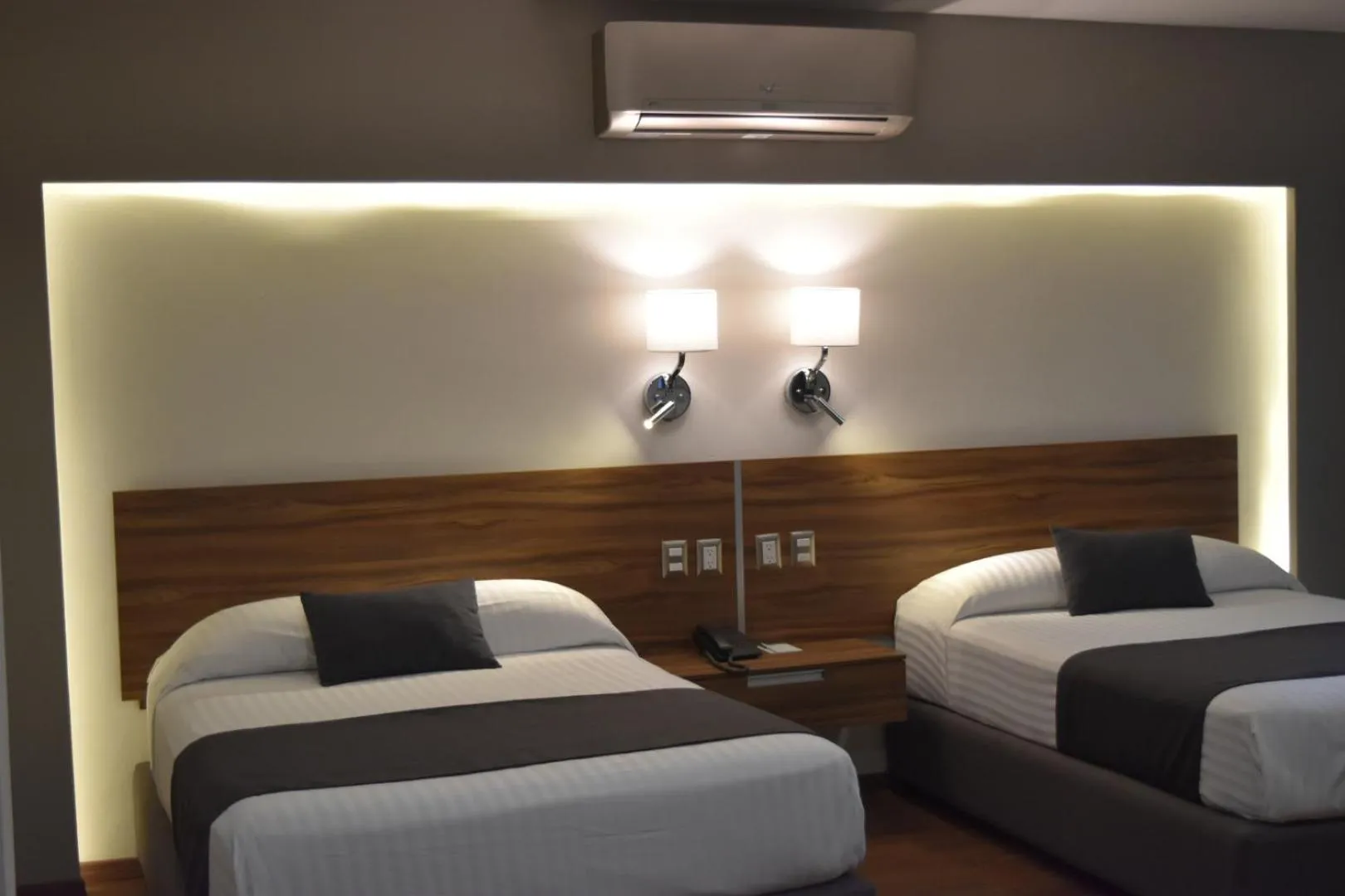 Bedroom, Bed in Estanza Hotel & Suites