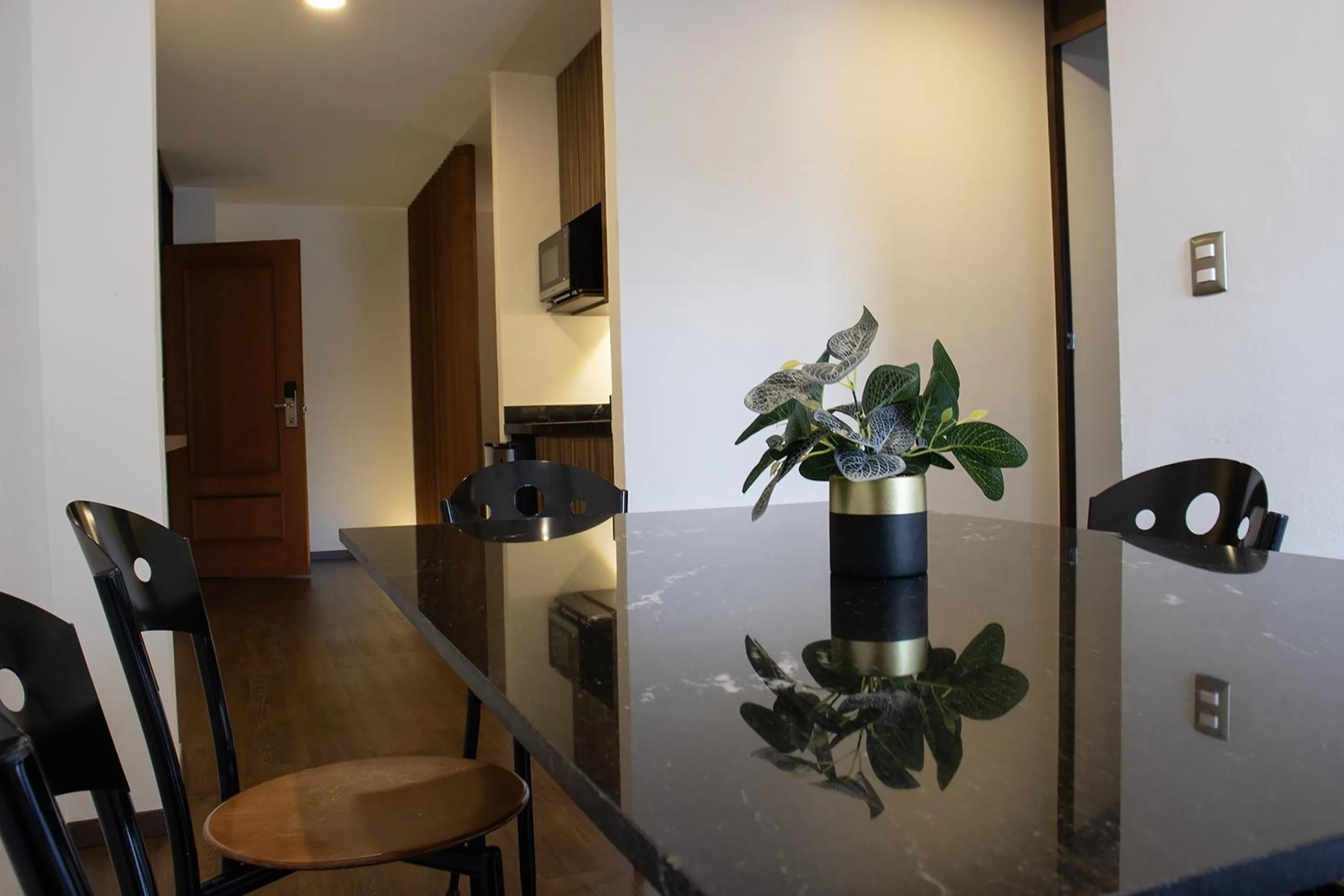 Living room in Estanza Hotel & Suites