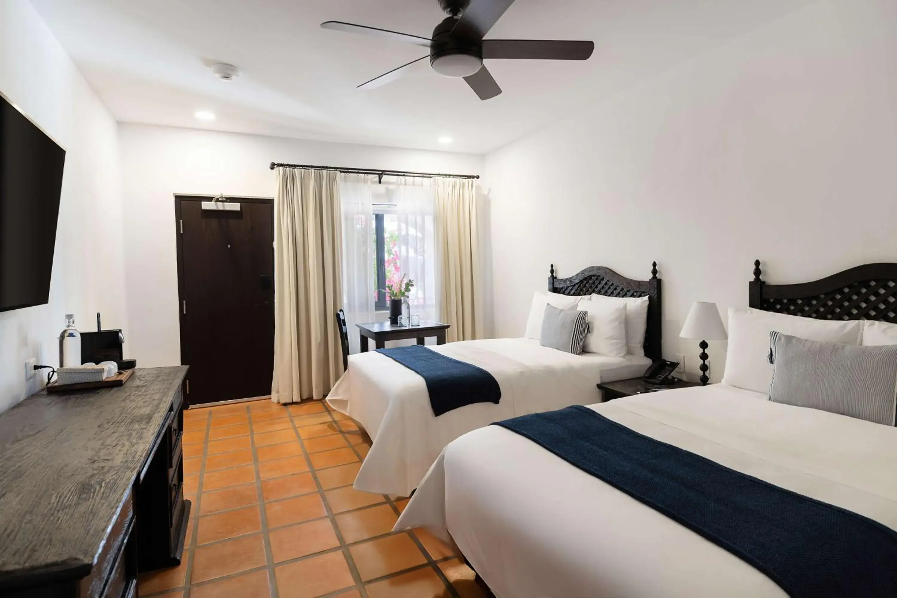 Guest Room with Two Full Beds in Tropicana Los Cabos, Tapestry Collection by Hilton Guest Room with Two Full Beds in Tropicana Los Cabos, Tapestry Collection by Hilton