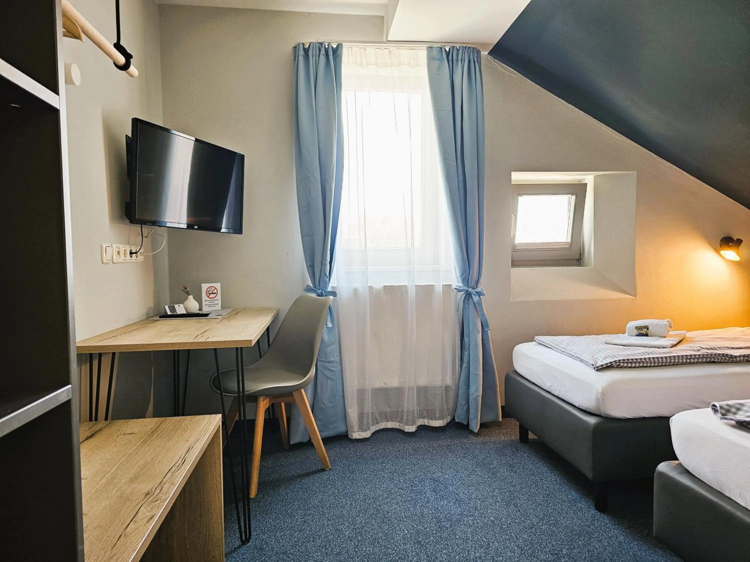 Photo of the whole room, Bed in ARRIVEL Pension Pliening - bisher Novitel