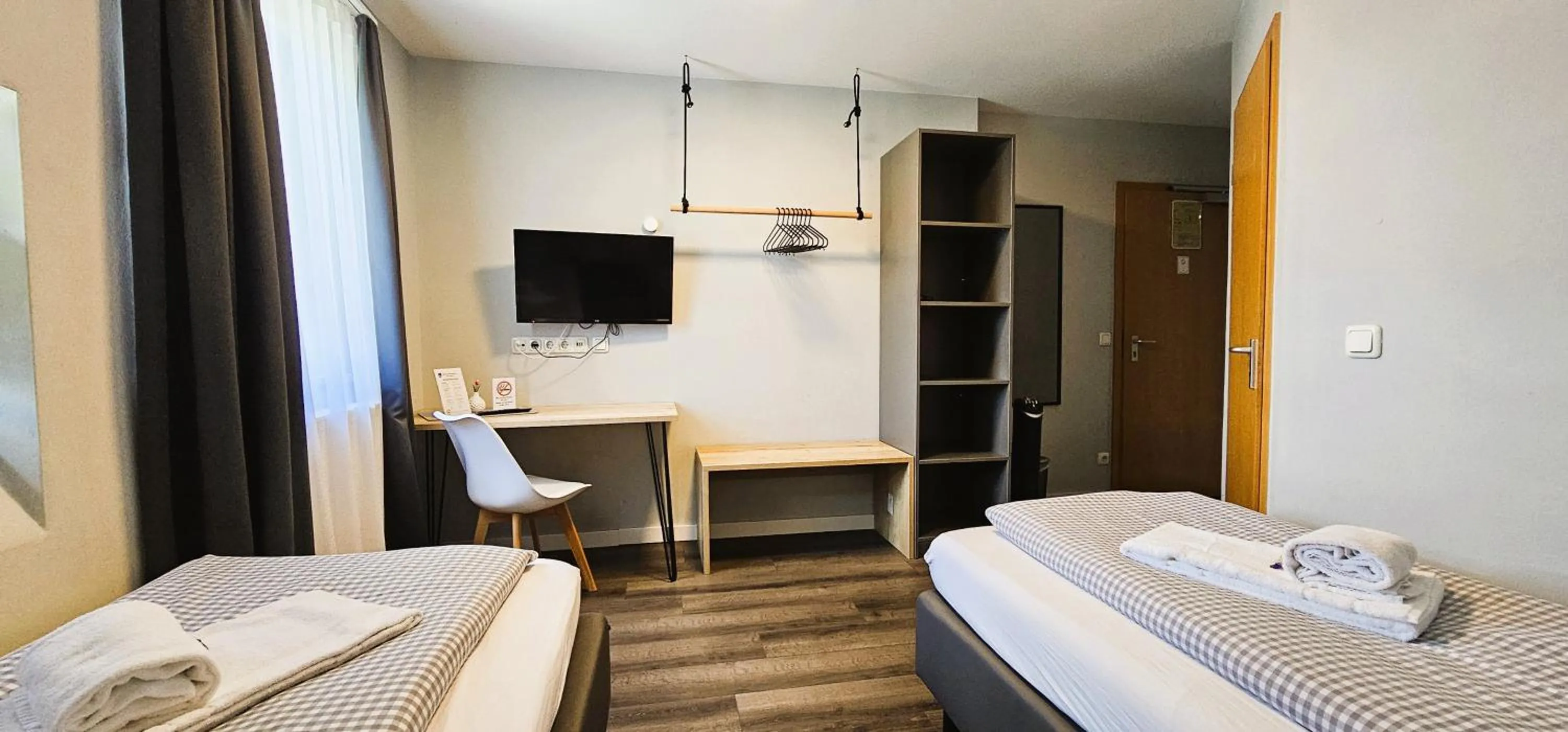 Photo of the whole room, Bed in ARRIVEL Pension Pliening - bisher Novitel