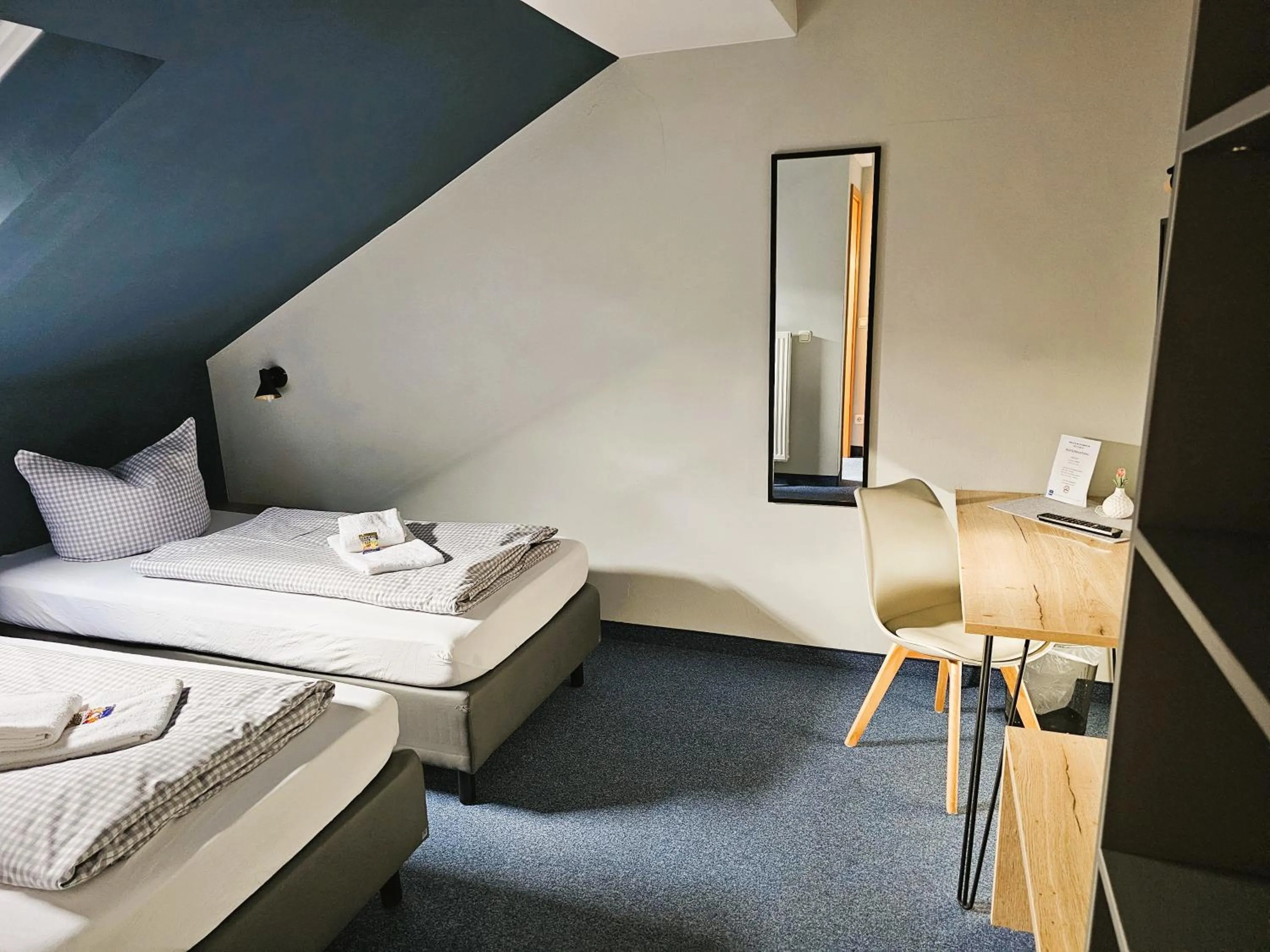 Photo of the whole room, Bed in ARRIVEL Pension Pliening - bisher Novitel