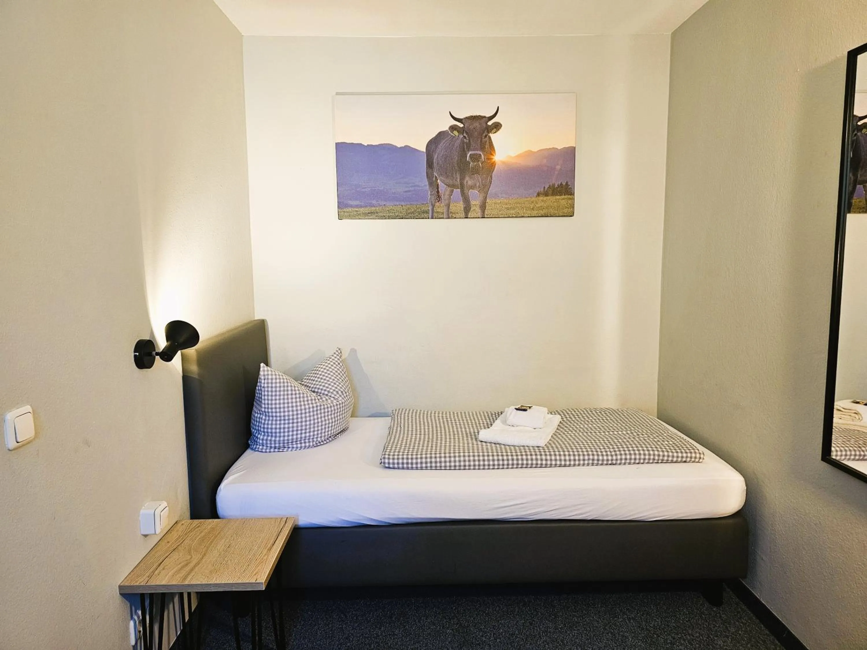 Photo of the whole room, Bed in ARRIVEL Pension Pliening - bisher Novitel