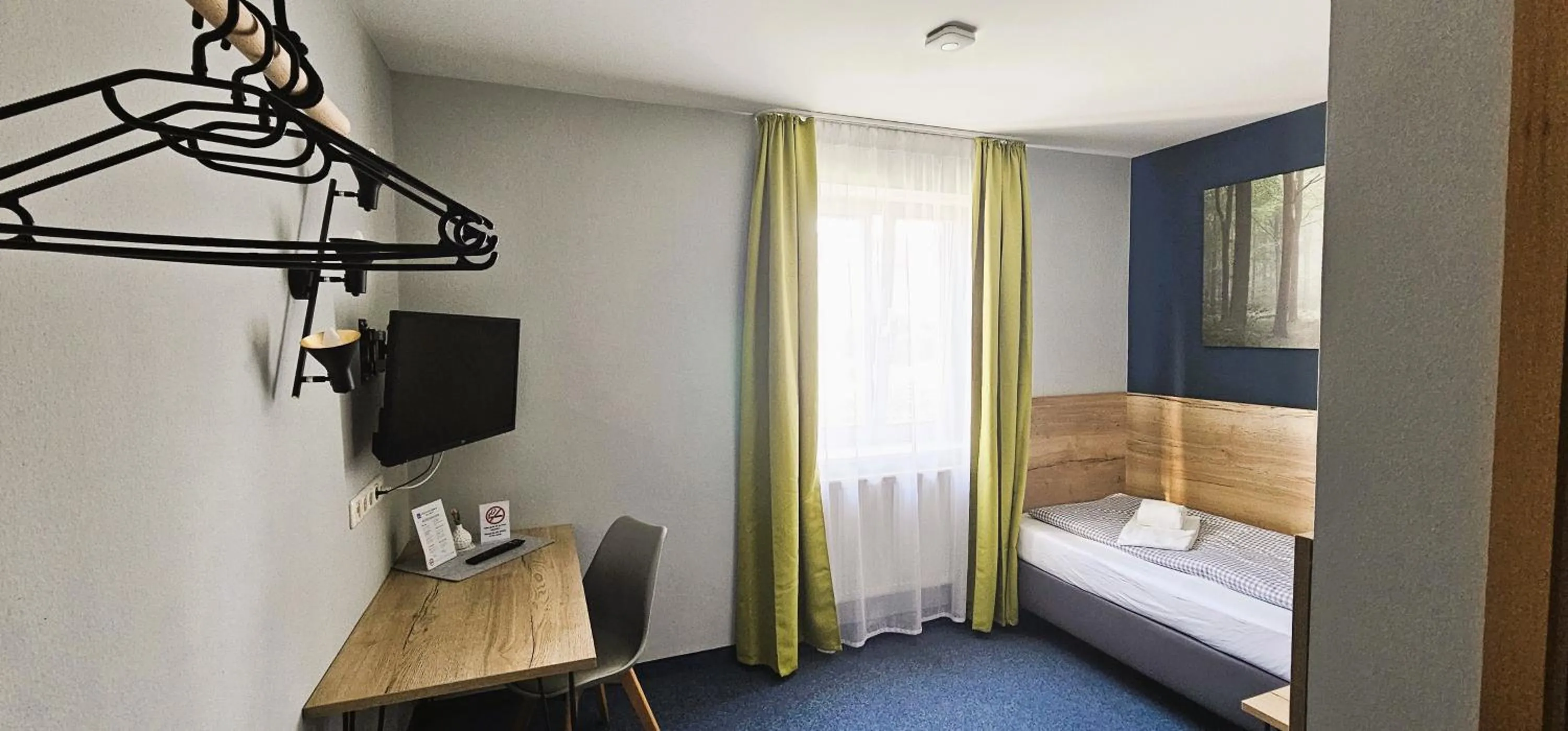 Photo of the whole room, Bed in ARRIVEL Pension Pliening - bisher Novitel