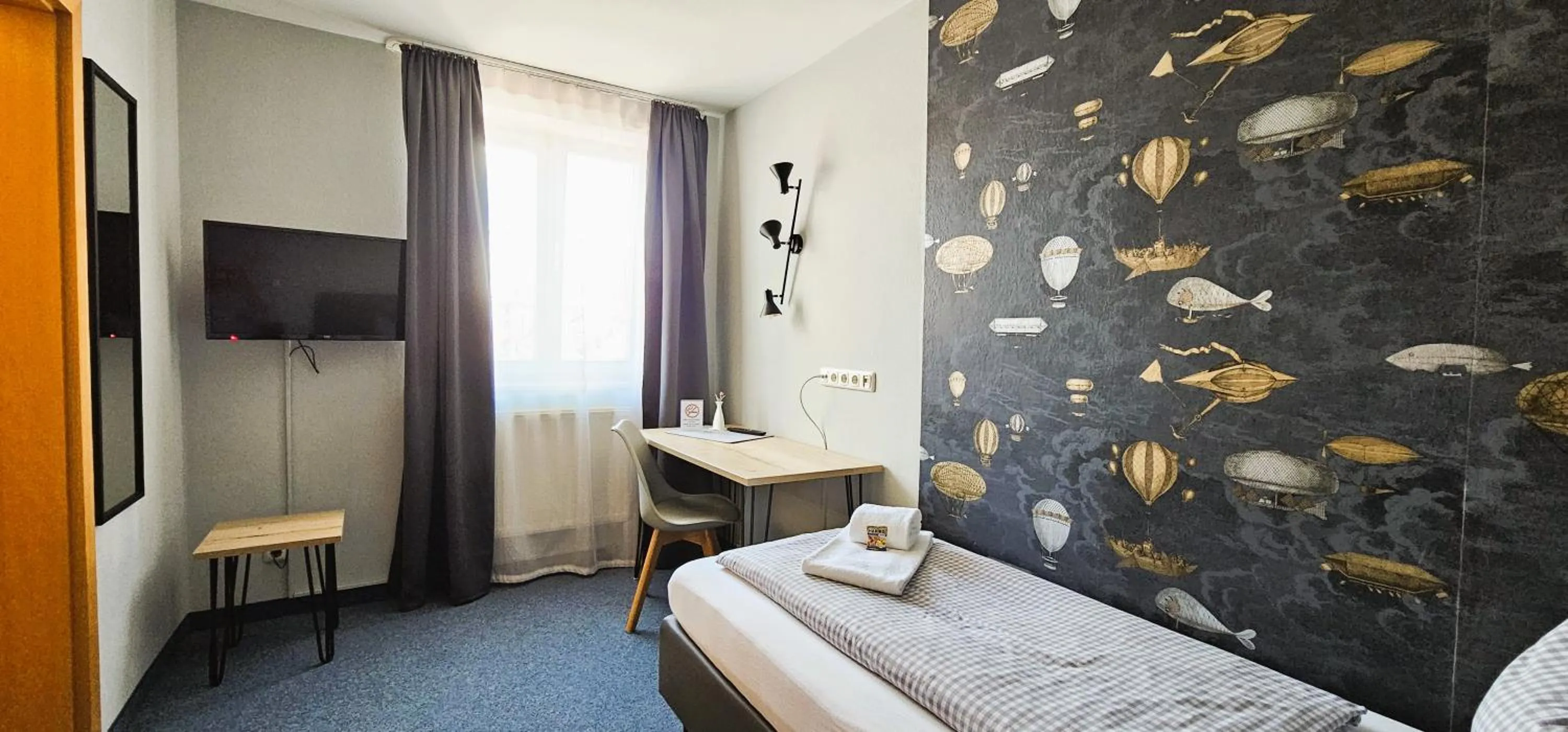 Photo of the whole room, Bed in ARRIVEL Pension Pliening - bisher Novitel