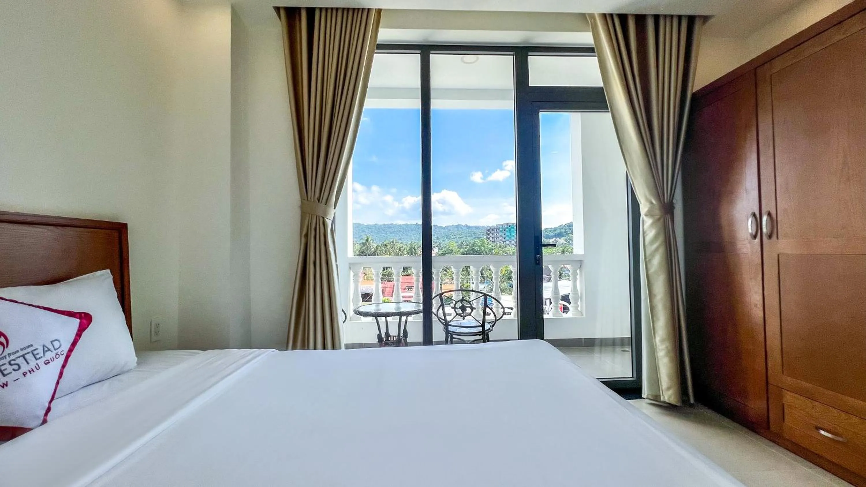 Bed in Homestead Seaview Phu Quoc Hotel