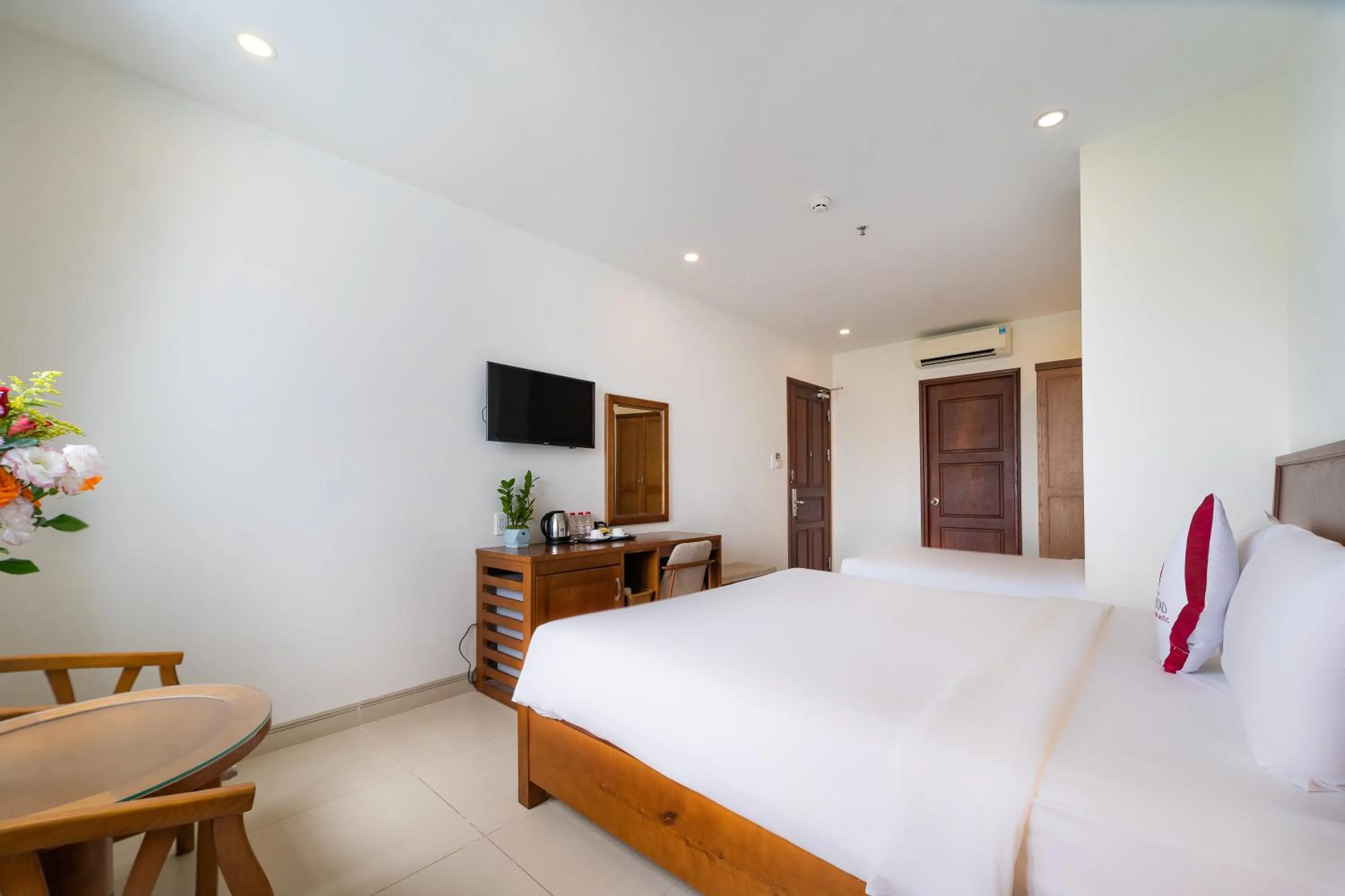 Bed in Homestead Seaview Phu Quoc Hotel