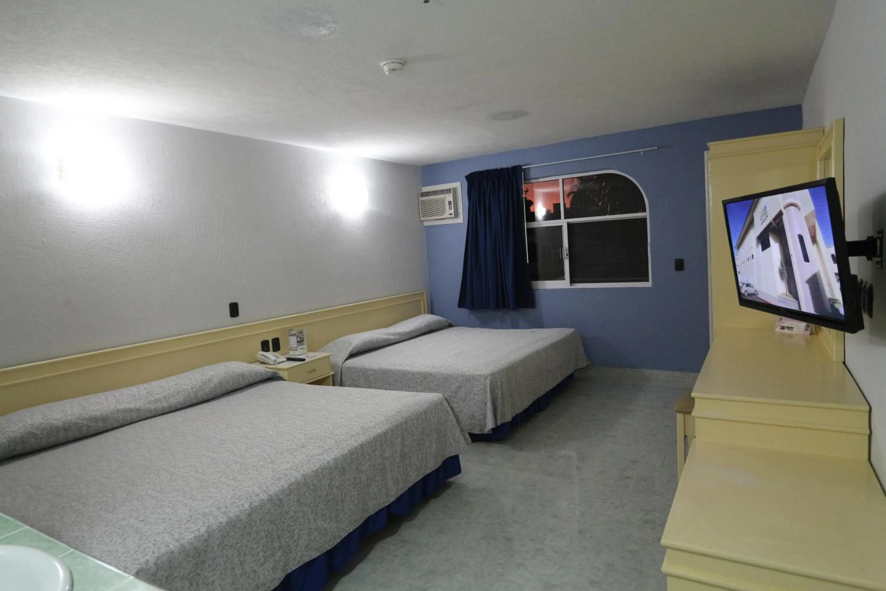 Bed in Dorados Conventions & Resort