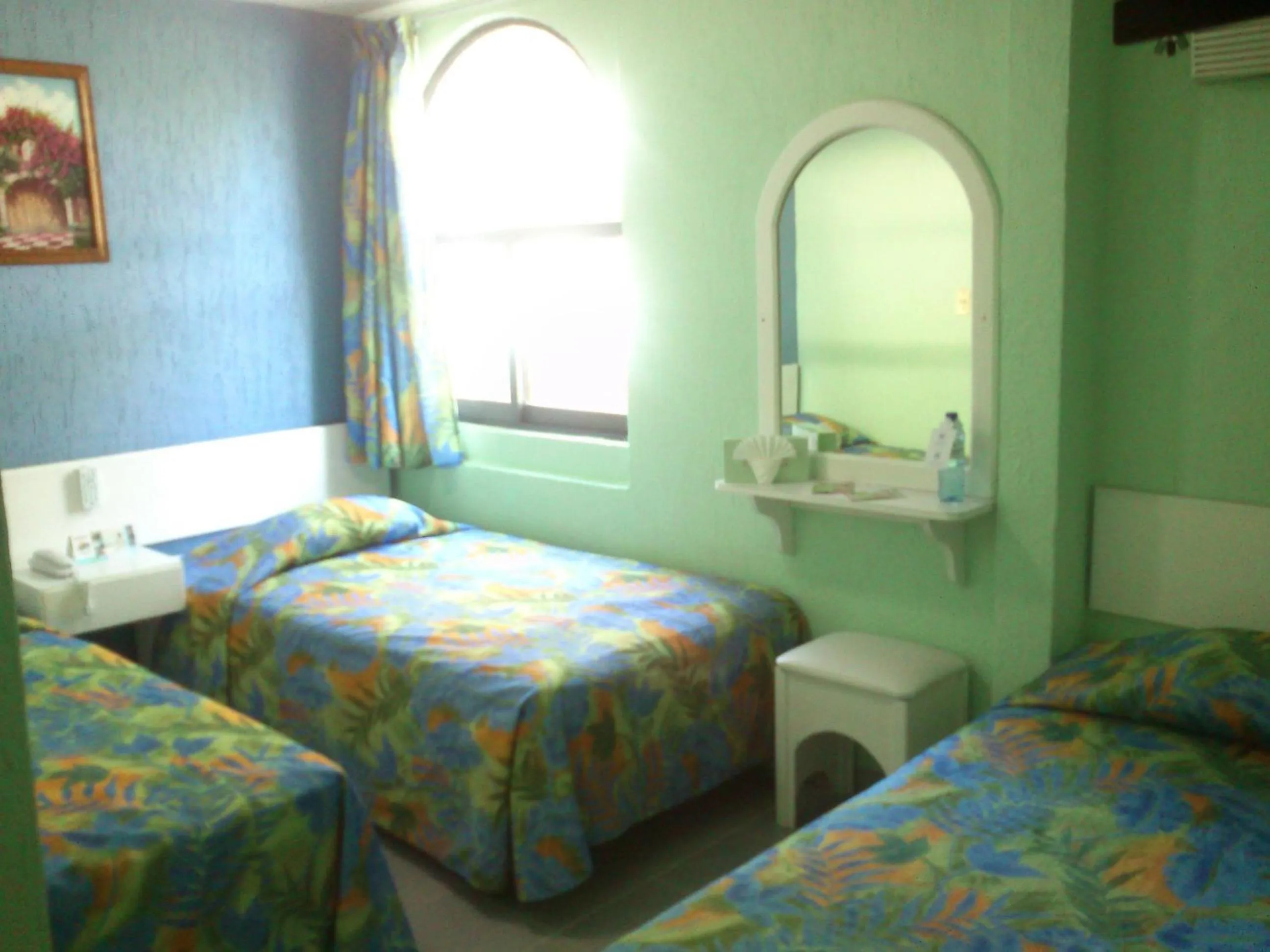 Bed in Dorados Conventions & Resort