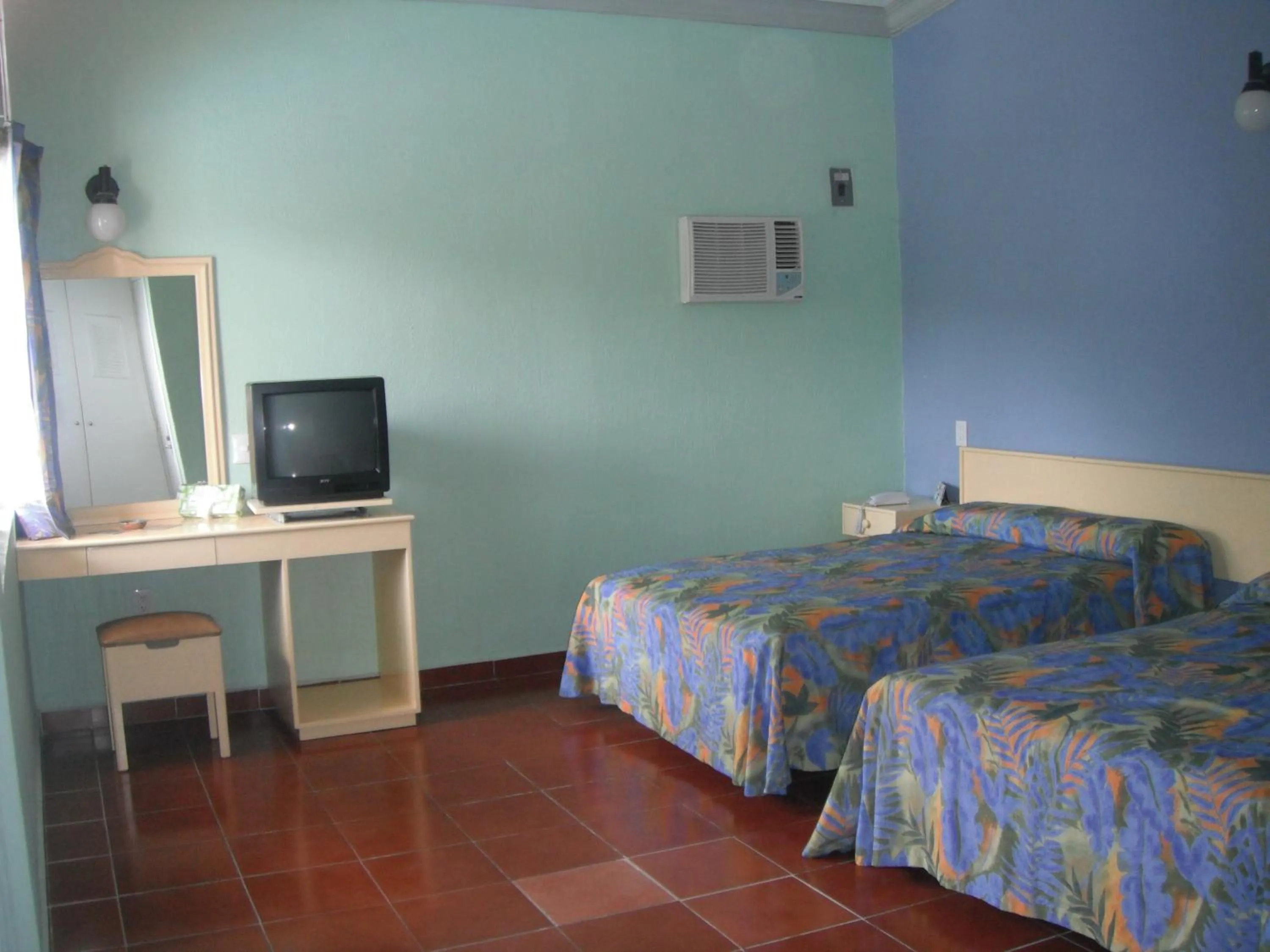 Photo of the whole room, Bed in Dorados Conventions & Resort