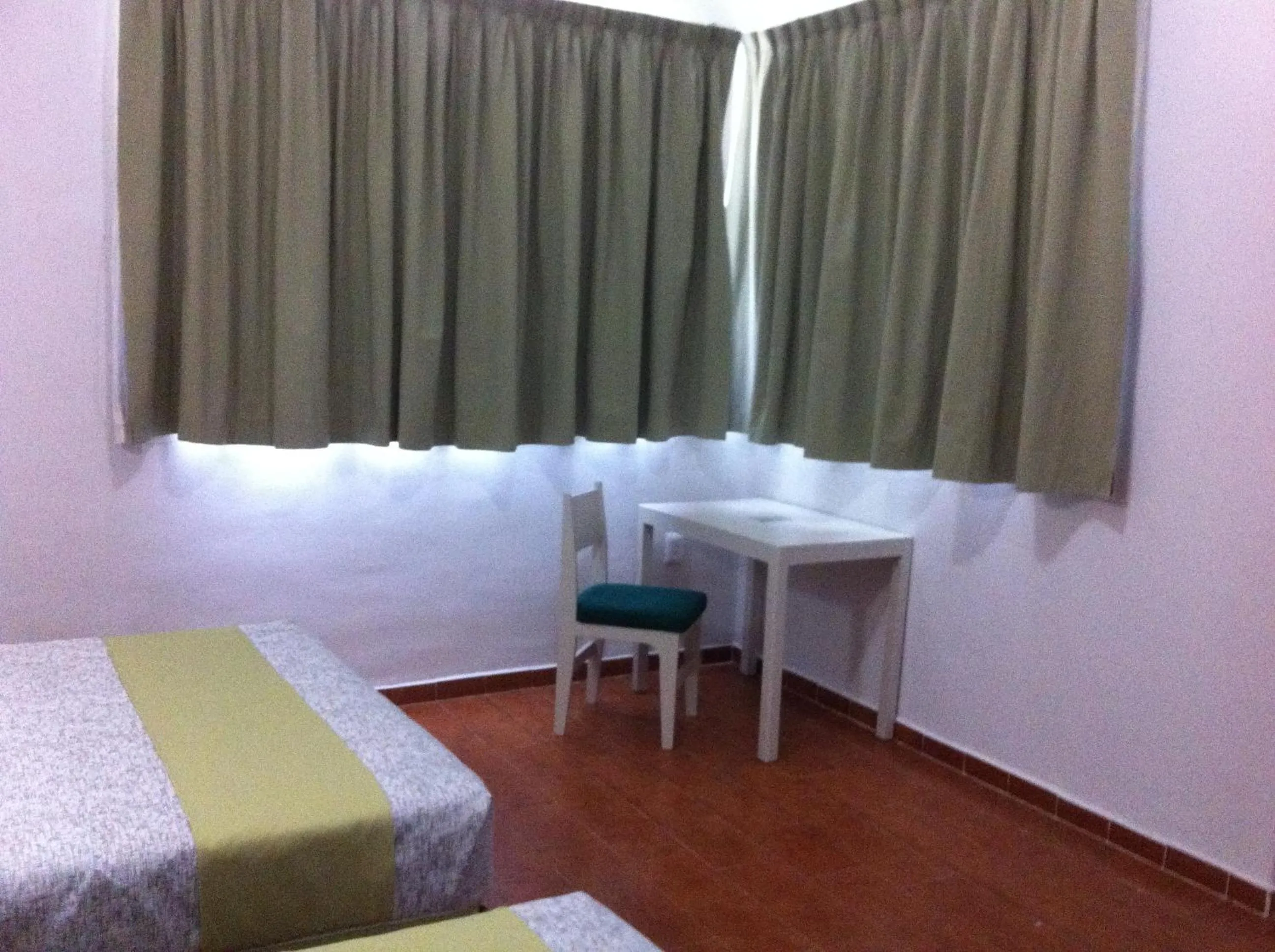 Bed in Dorados Conventions & Resort